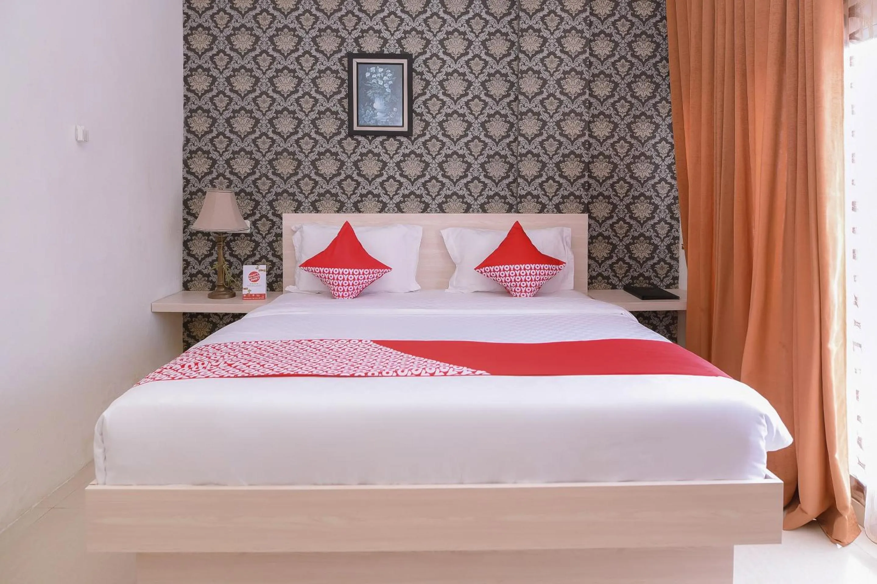 Bedroom in Capital O 854 Ub Caisar Hotel