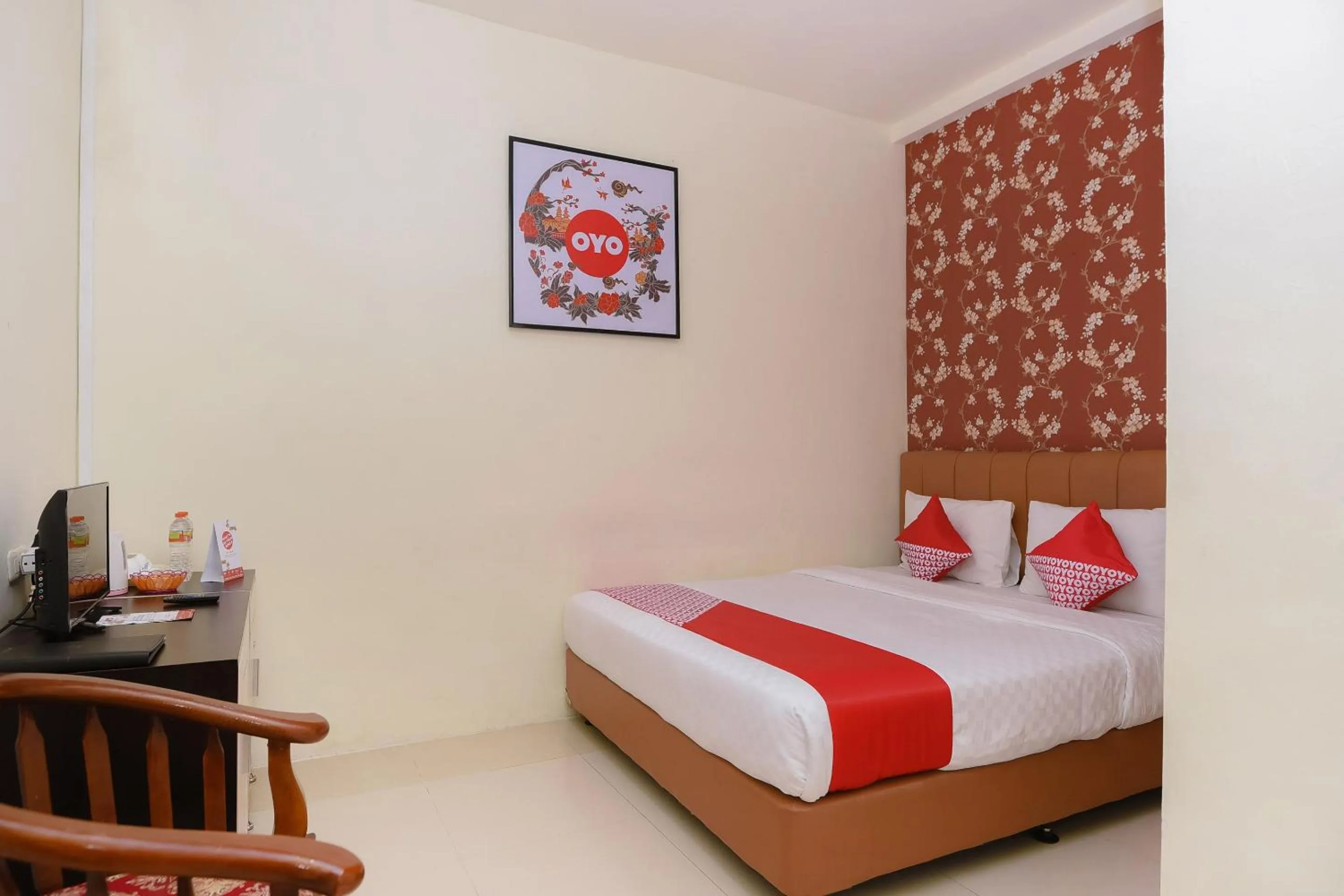 Bedroom in Capital O 854 Ub Caisar Hotel