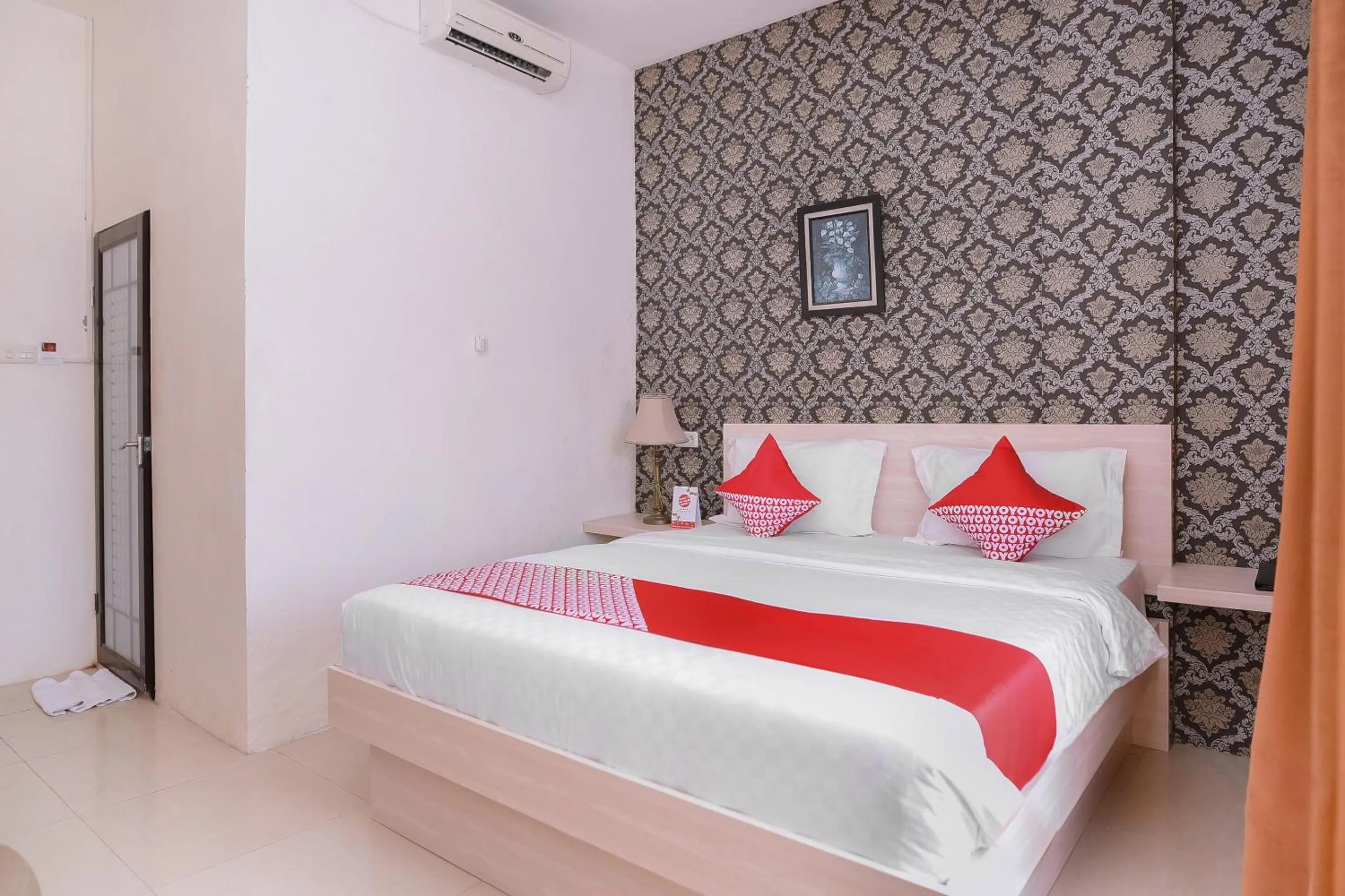 Bedroom in Capital O 854 Ub Caisar Hotel