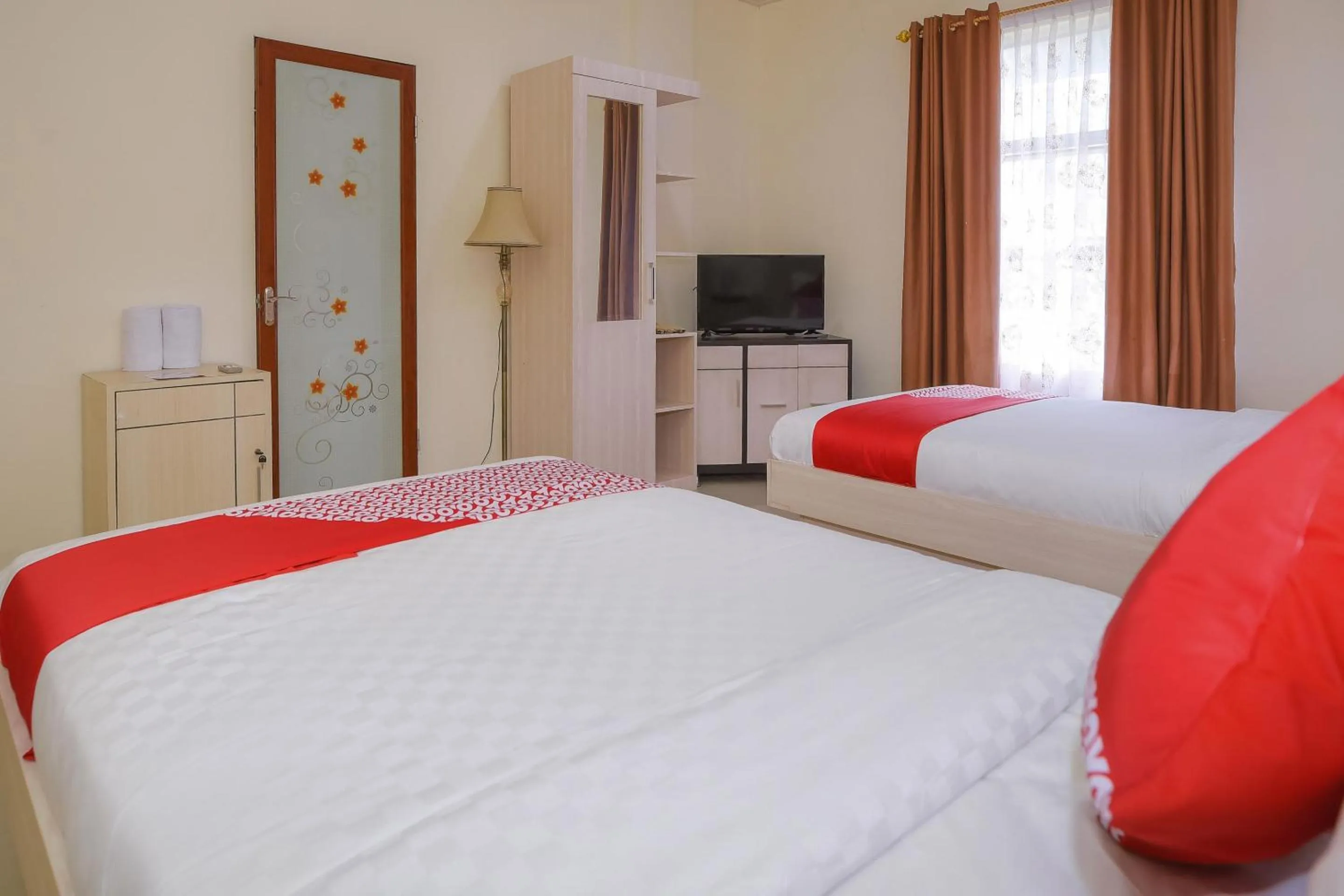 Bedroom in Capital O 854 Ub Caisar Hotel