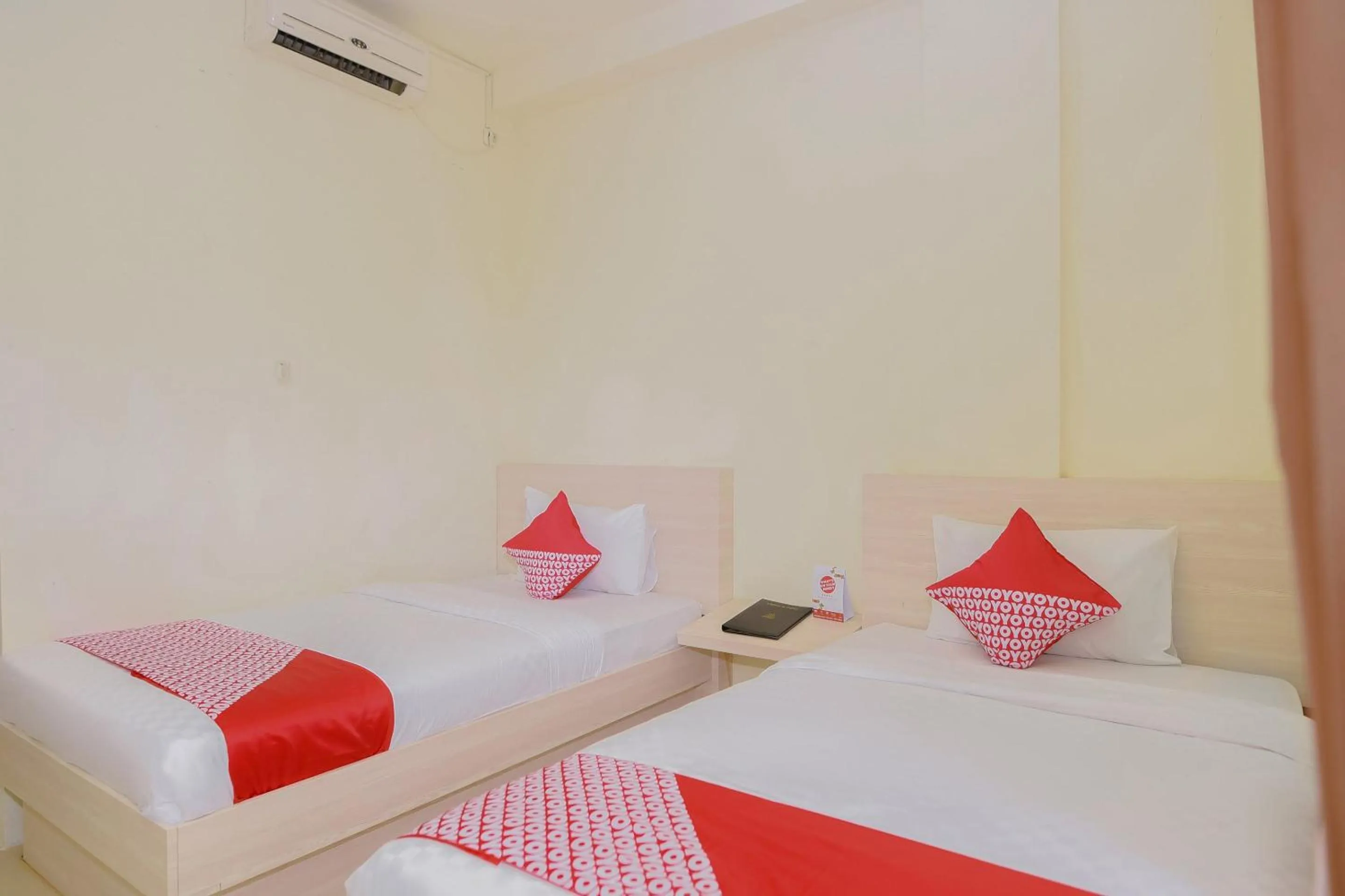 Bedroom in Capital O 854 Ub Caisar Hotel