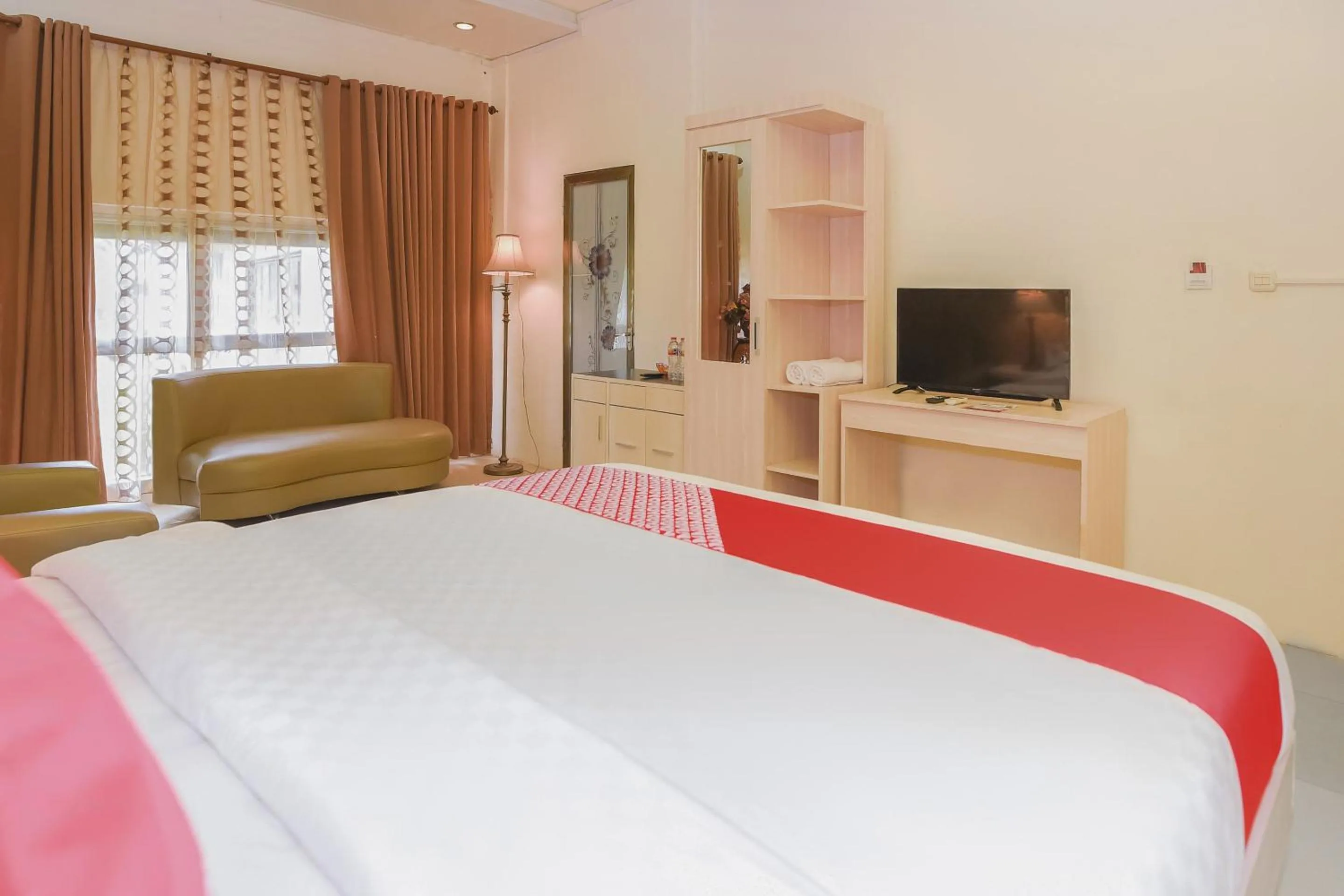 Bedroom in Capital O 854 Ub Caisar Hotel