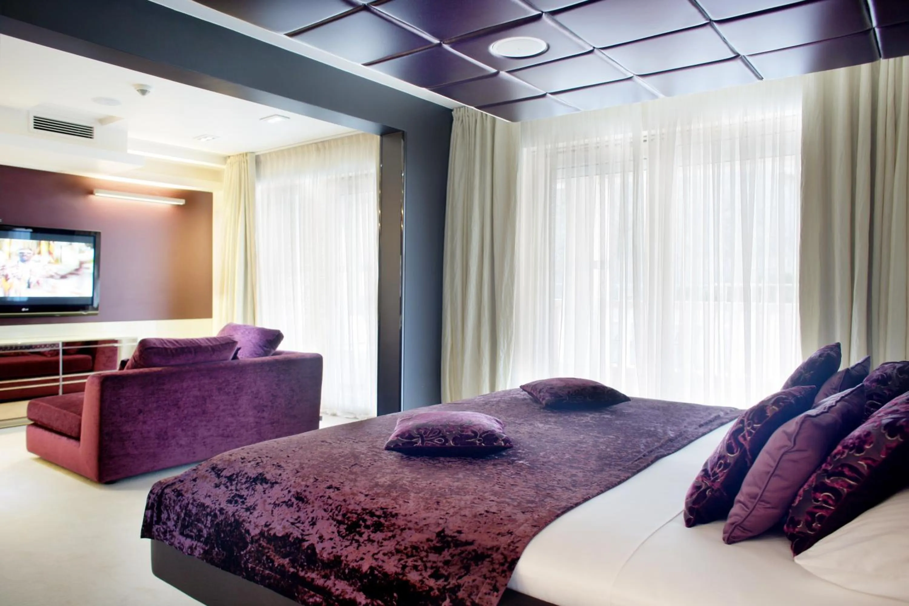 Bed in Damianii Luxury Boutique Hotel & Spa