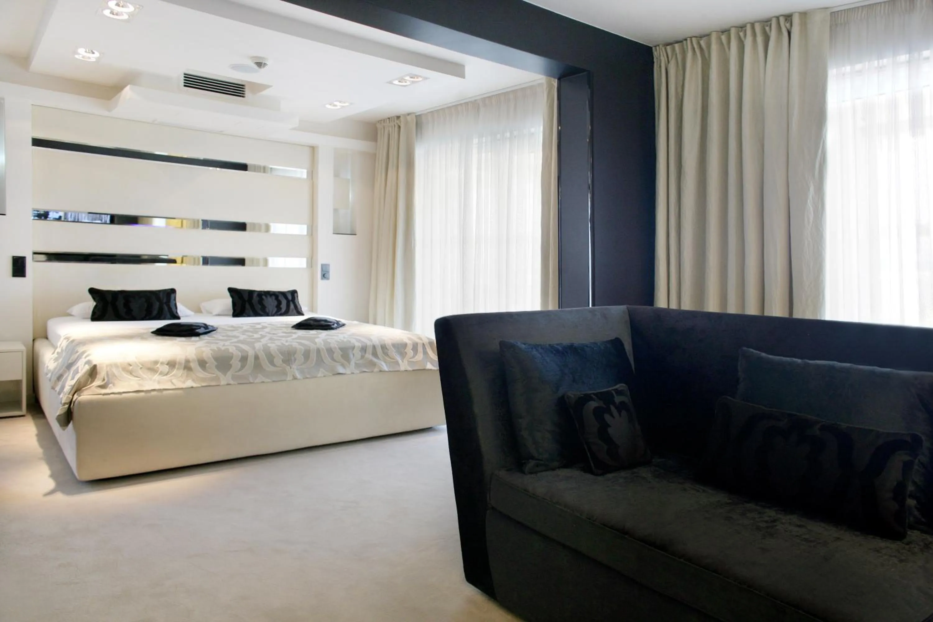 Bed in Damianii Luxury Boutique Hotel & Spa