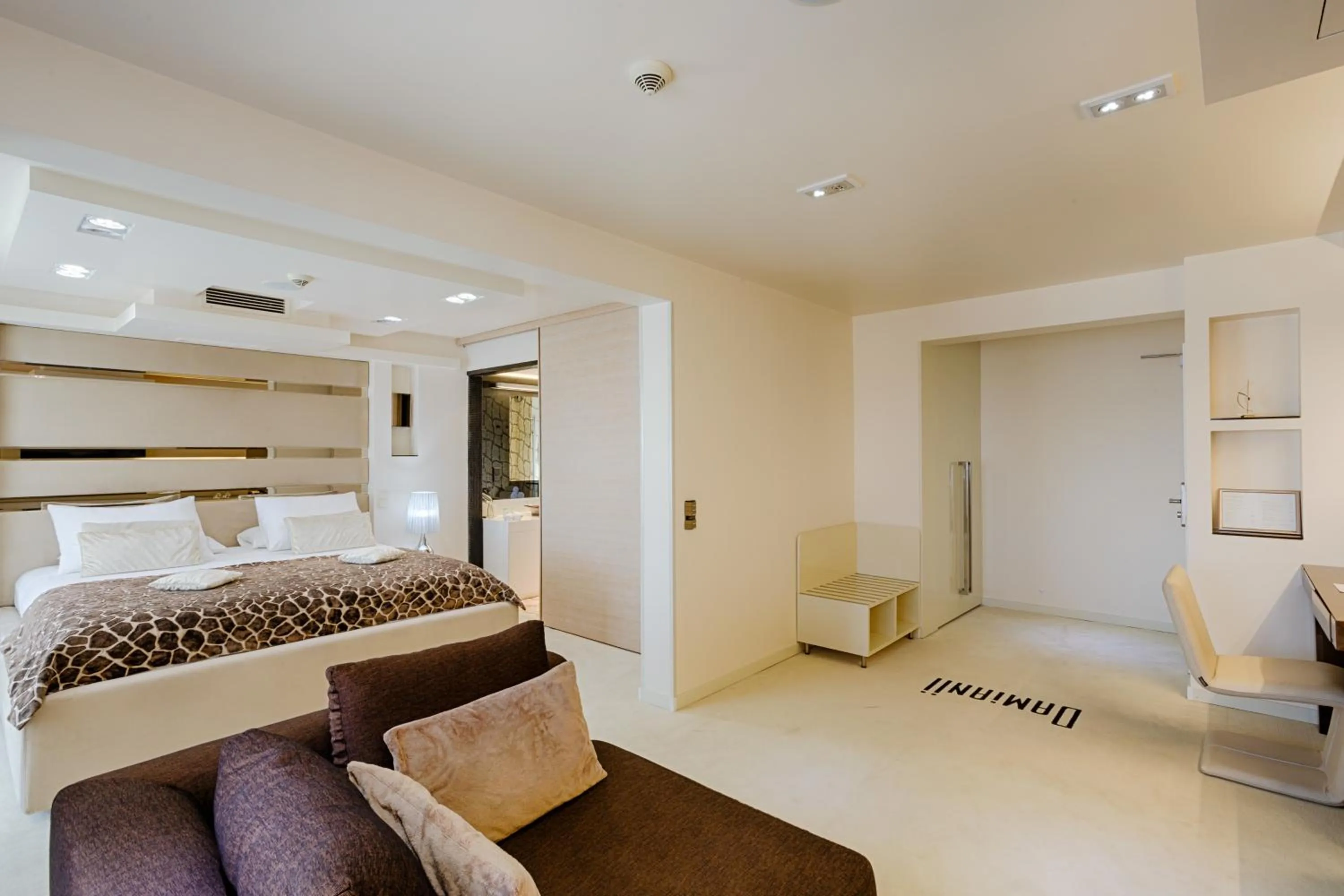 Bed in Damianii Luxury Boutique Hotel & Spa