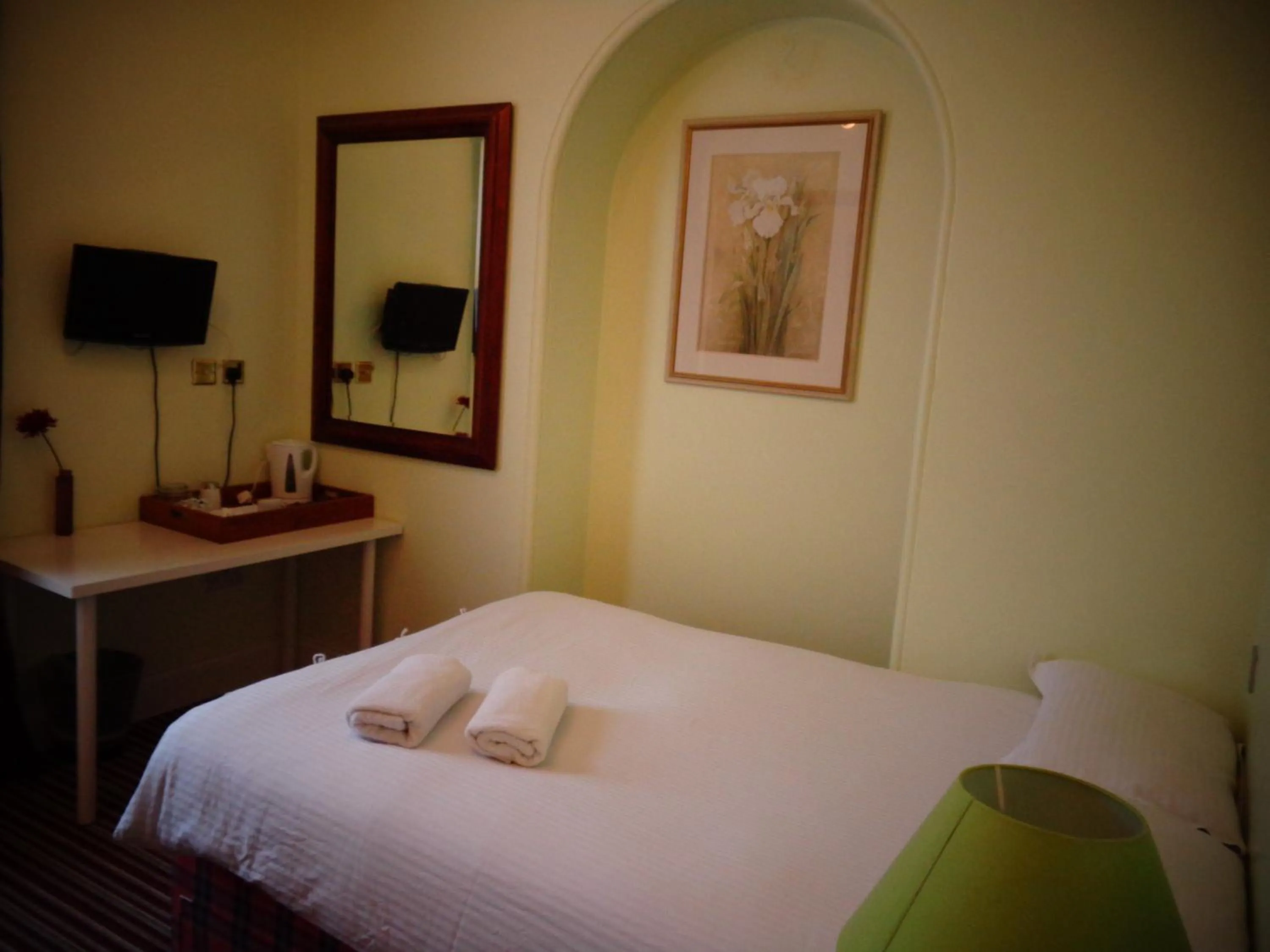 Bed in Aron Guest House