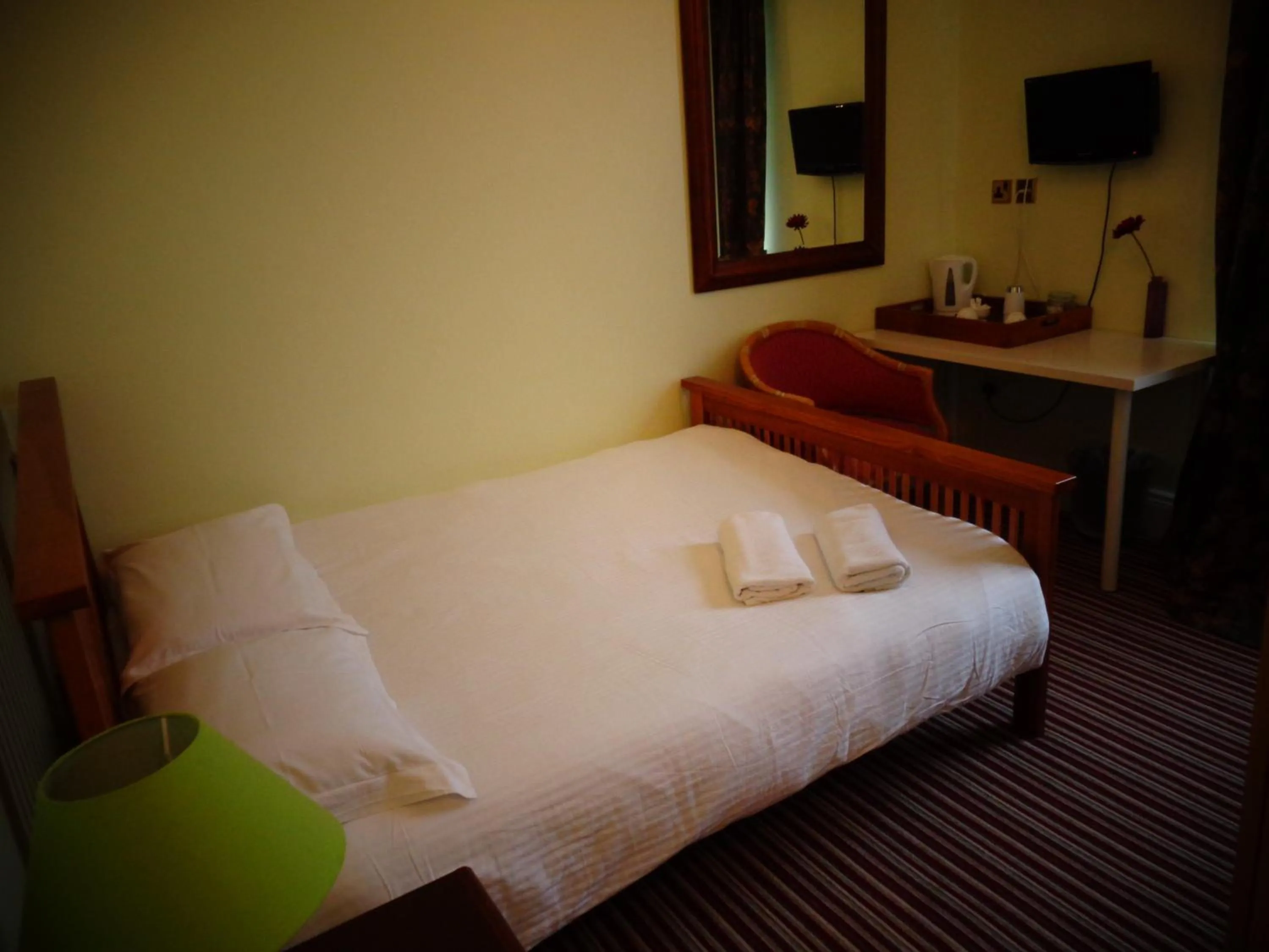 Bed in Aron Guest House