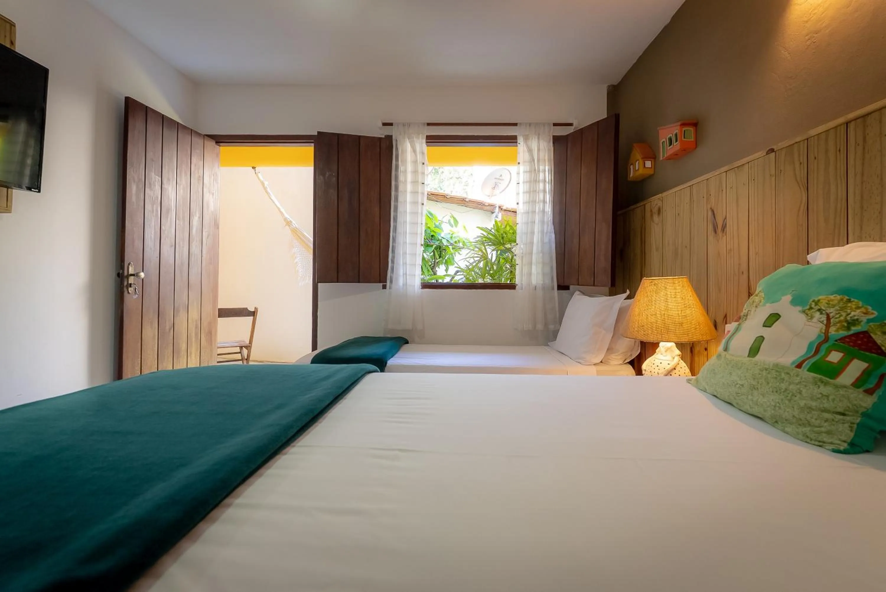 Bed in Pousada Por do Sol Trancoso