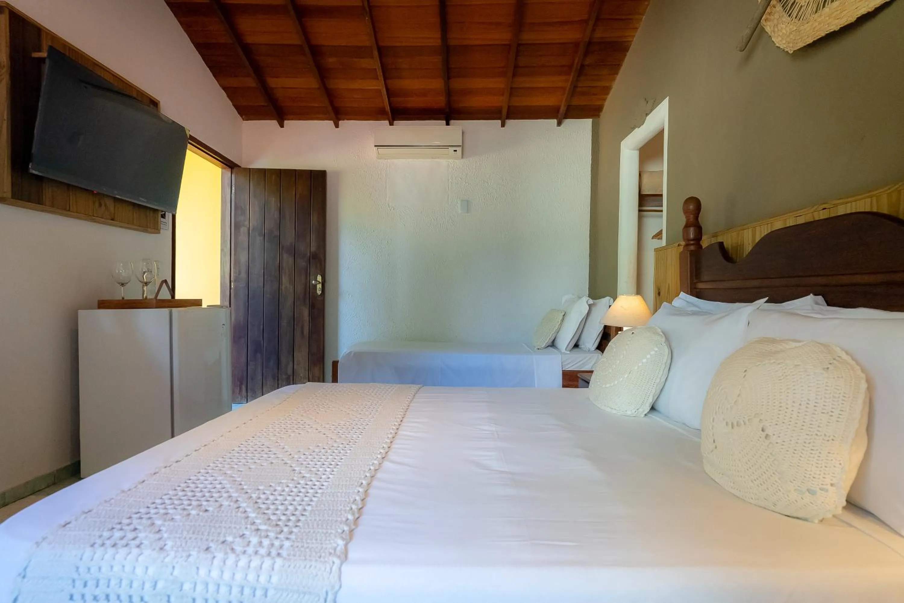 Bed in Pousada Por do Sol Trancoso