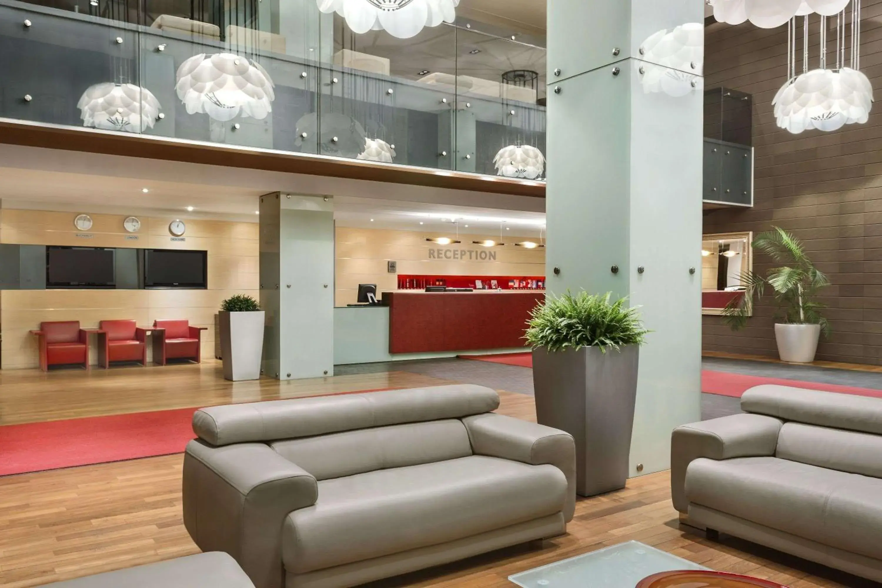 Lobby or reception in Ramada Sibiu Hotel Lobby or reception in Ramada Sibiu Hotel