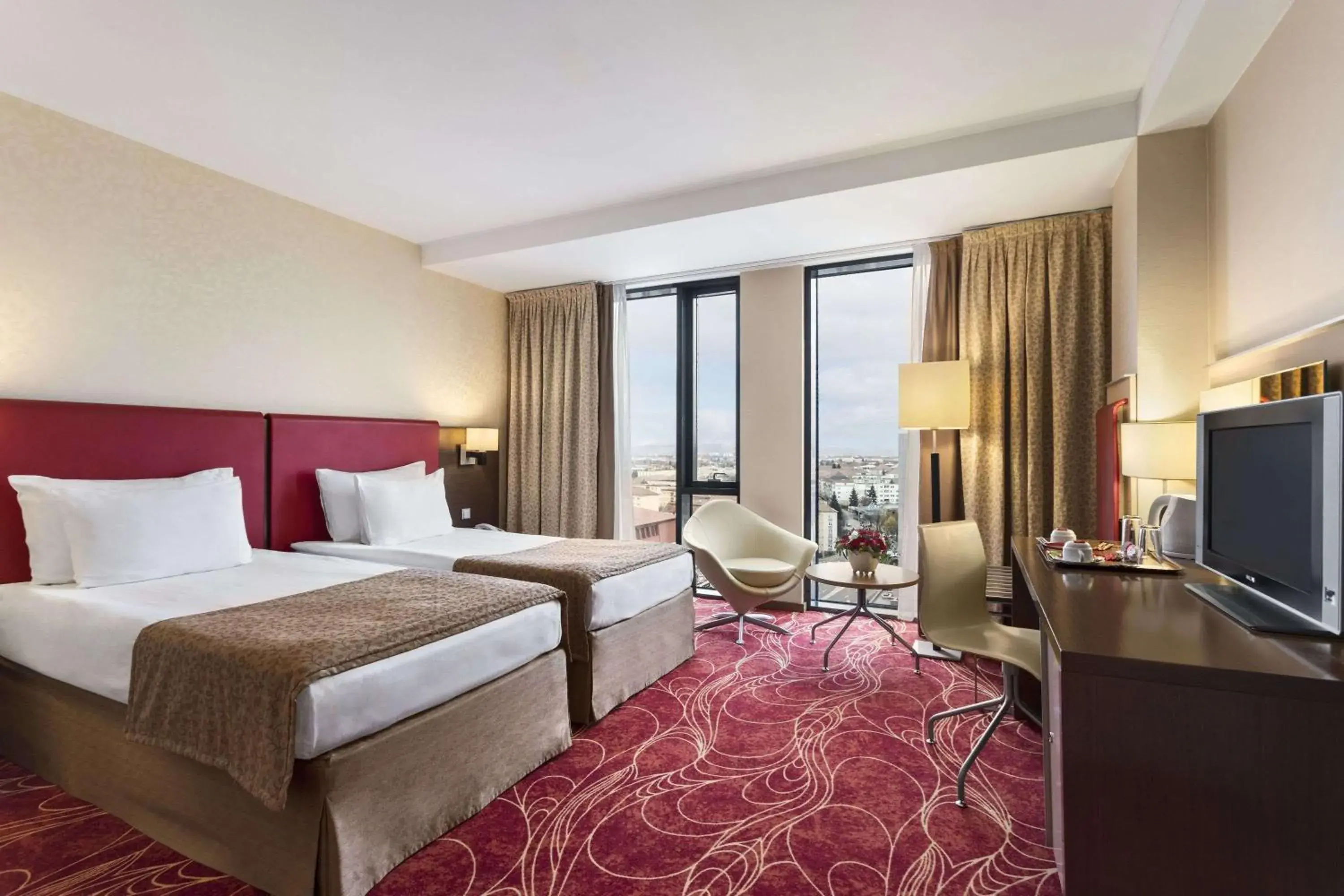 Photo of the whole room, Bed in Ramada Sibiu Hotel Photo of the whole room, Bed in Ramada Sibiu Hotel