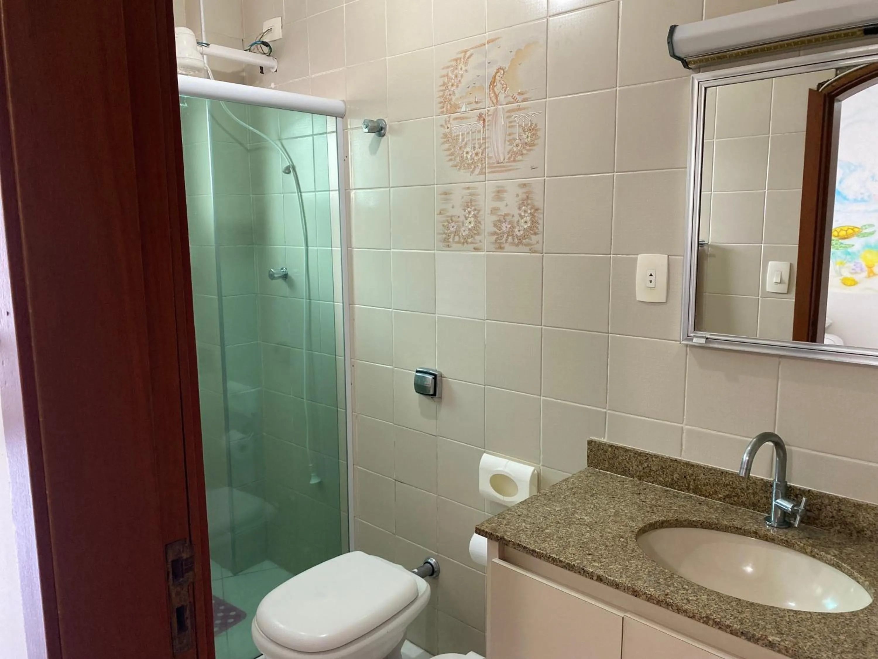 Bathroom in Apto praia do Tombo - Guarujá