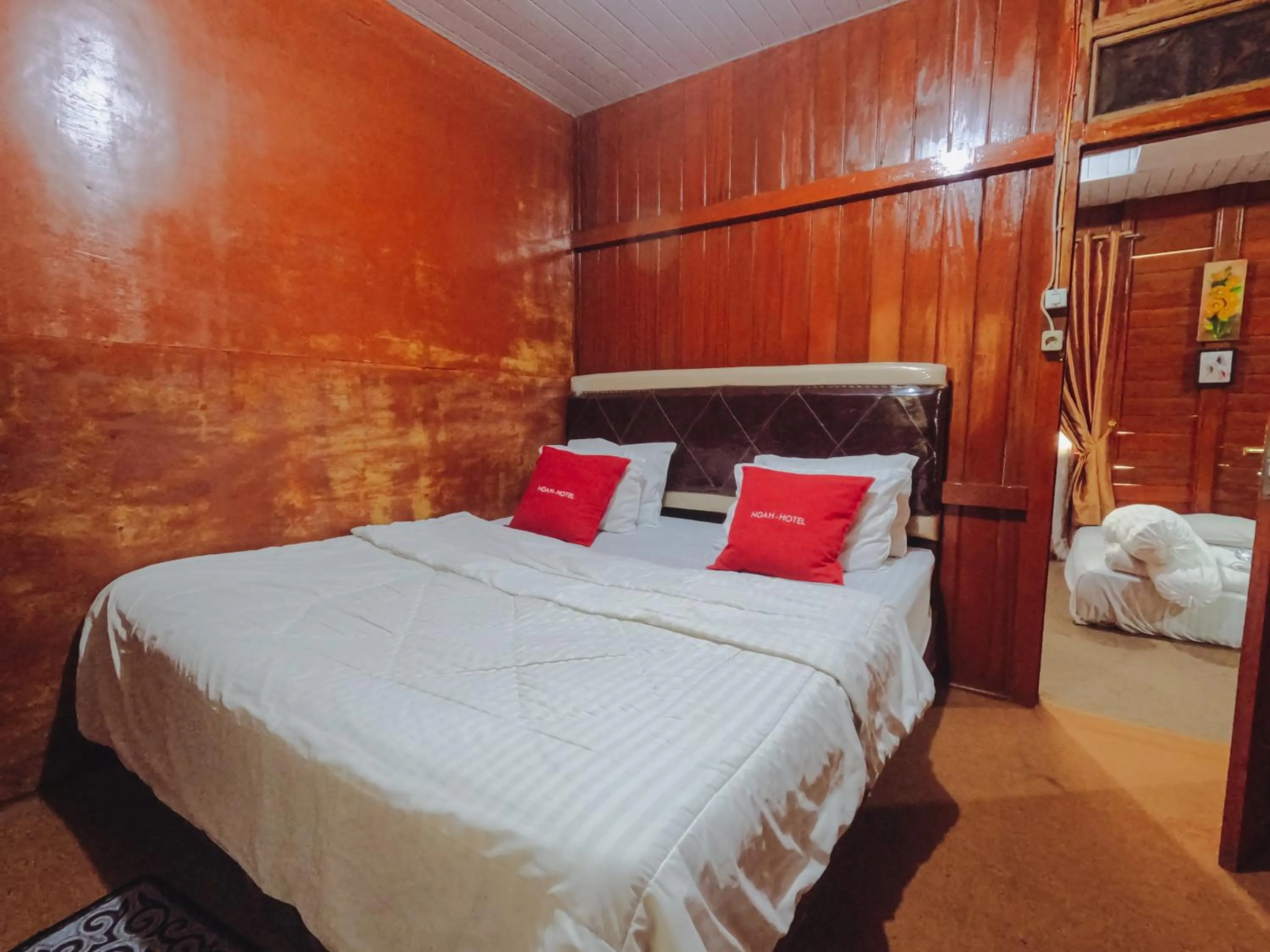Bed in Noah Hotel Silangit
