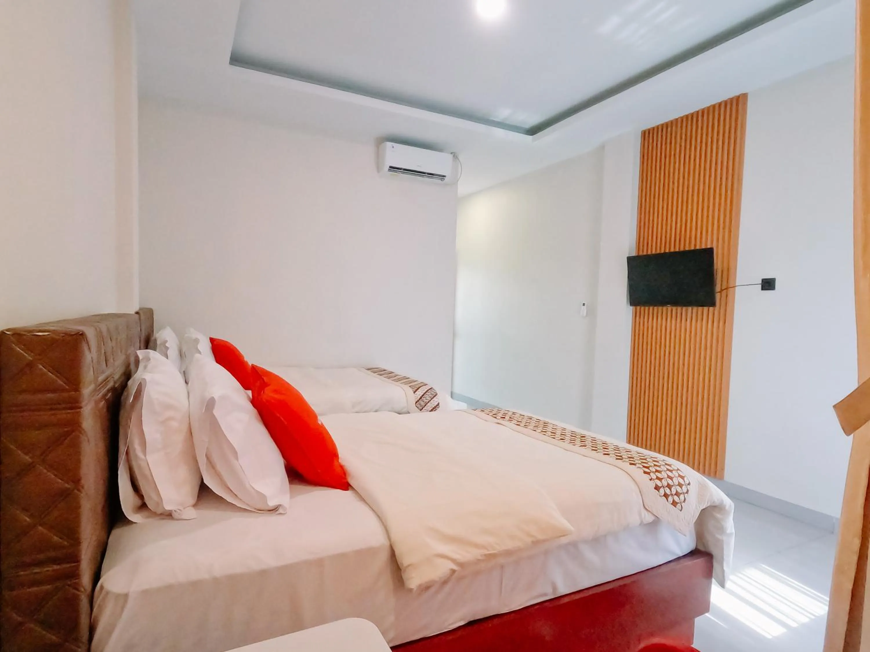 Bed in Noah Hotel Silangit