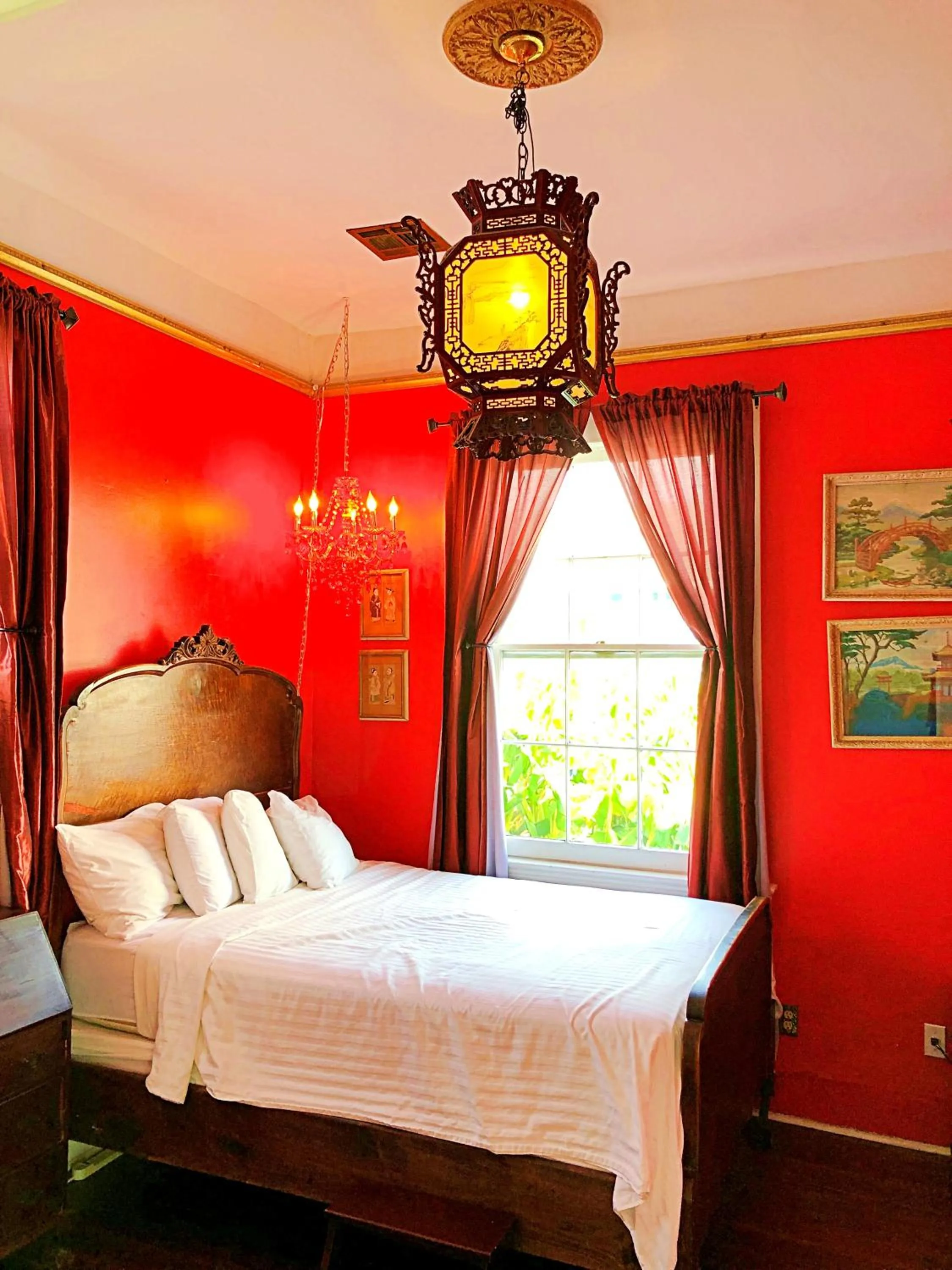Bed in Creole Gardens Guesthouse and Inn