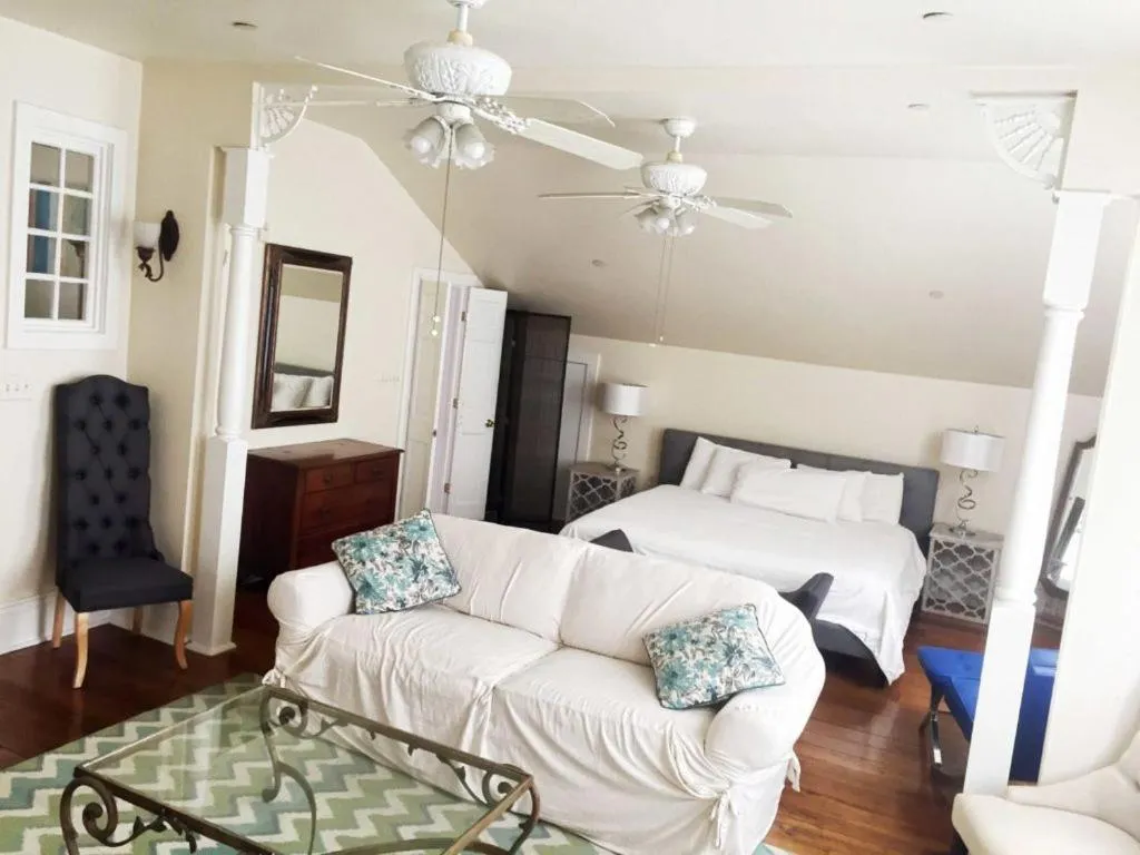 Bed in Creole Gardens Guesthouse and Inn