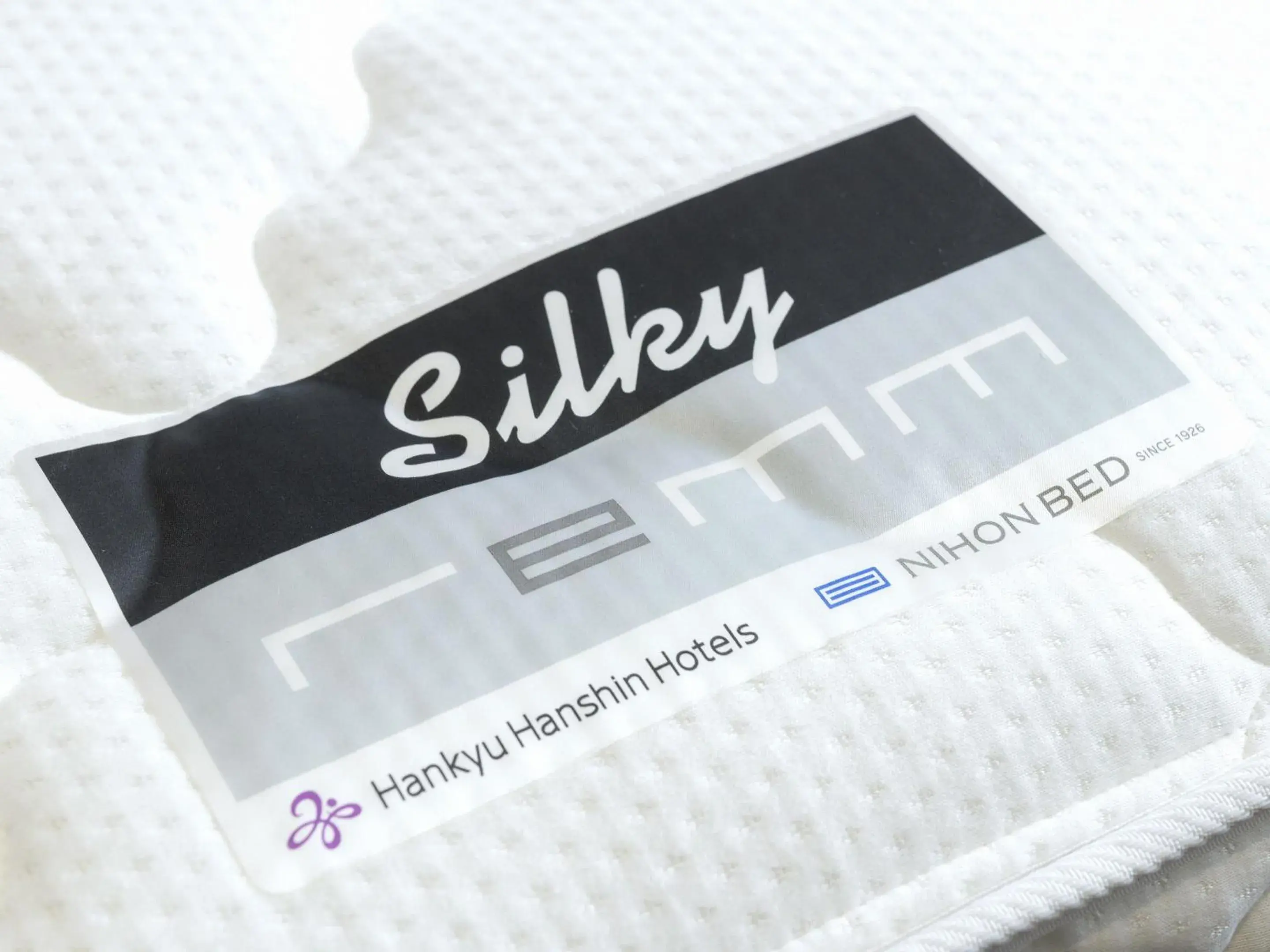 Bed in remm Shin-Osaka Bed in remm Shin-Osaka