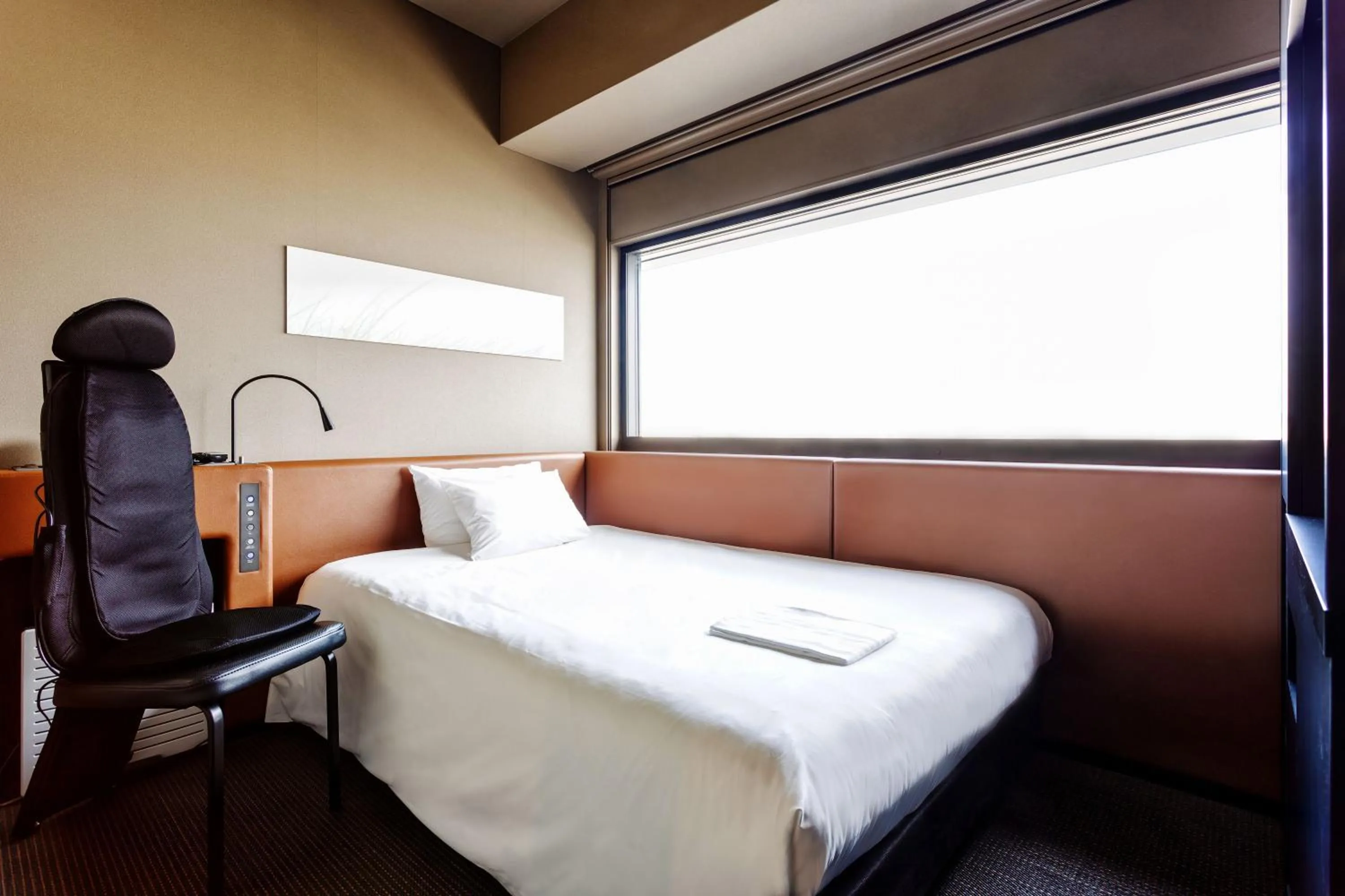 Photo of the whole room, Bed in remm Shin-Osaka