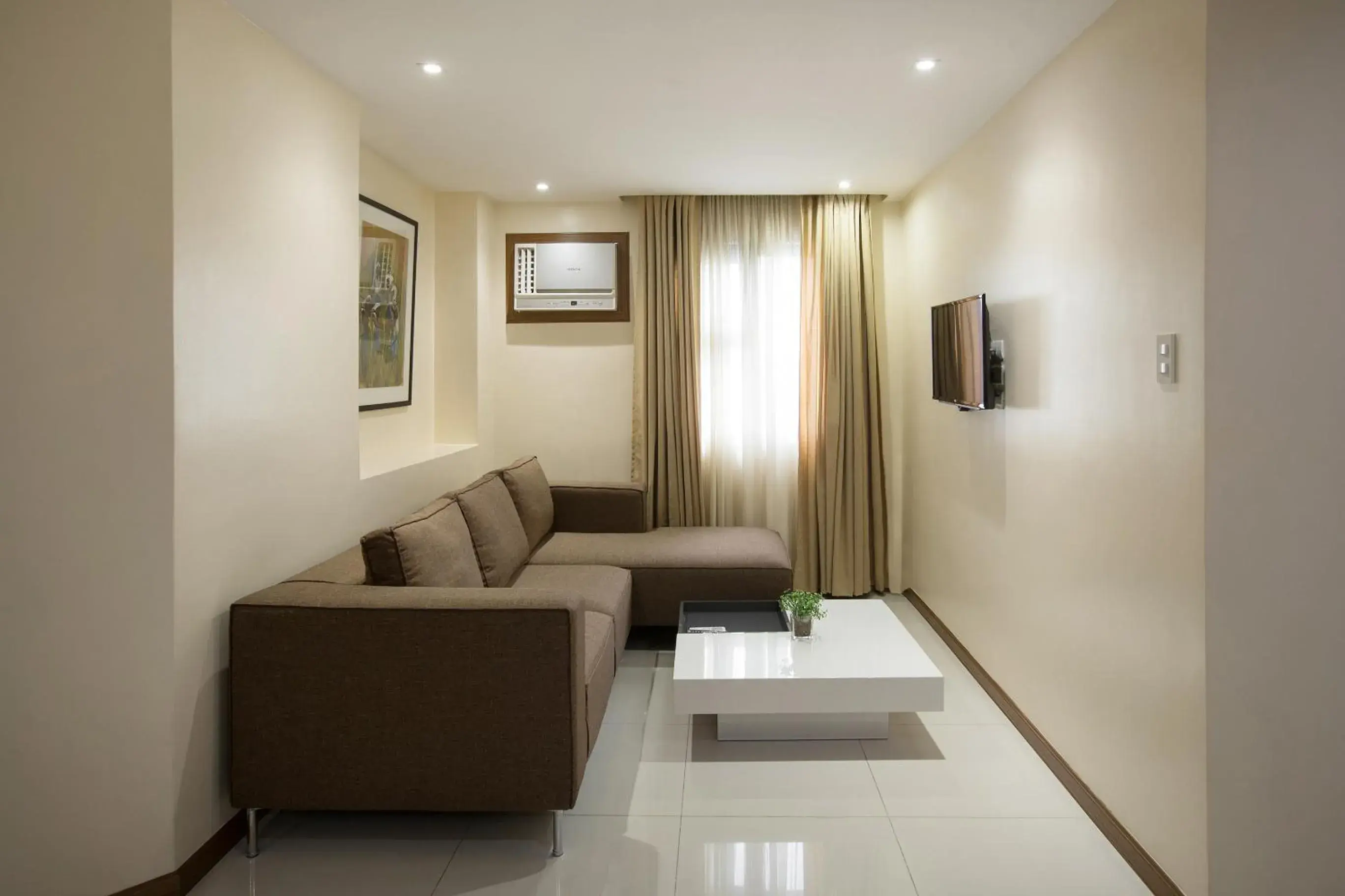 Living room in Golden Prince Hotel & Suites Living room in Golden Prince Hotel & Suites