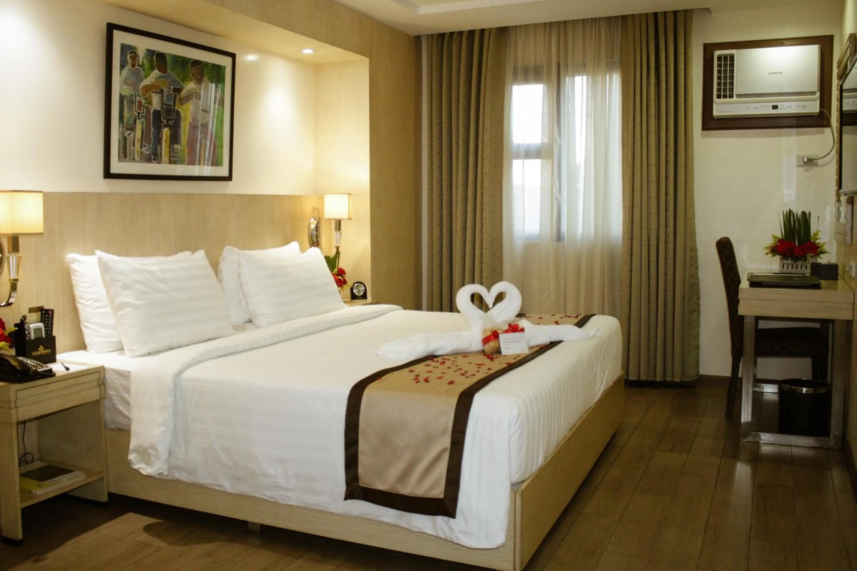 Bed in Golden Prince Hotel & Suites