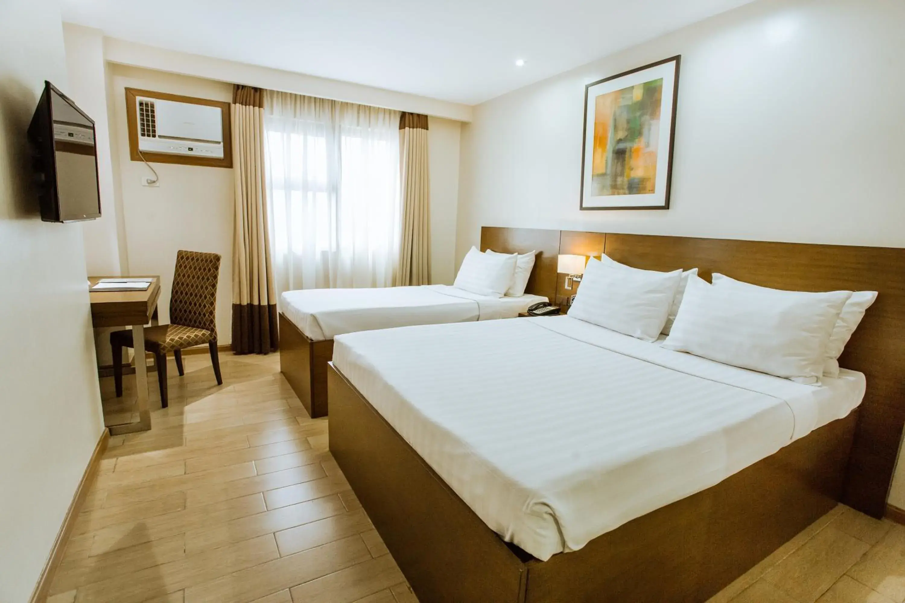 Photo of the whole room, Bed in Golden Prince Hotel & Suites Photo of the whole room, Bed in Golden Prince Hotel & Suites