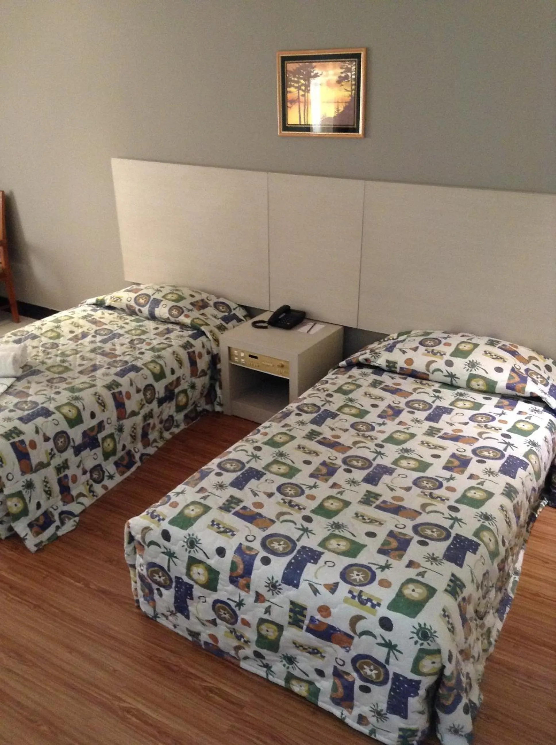 Bed in Purnama Hotel