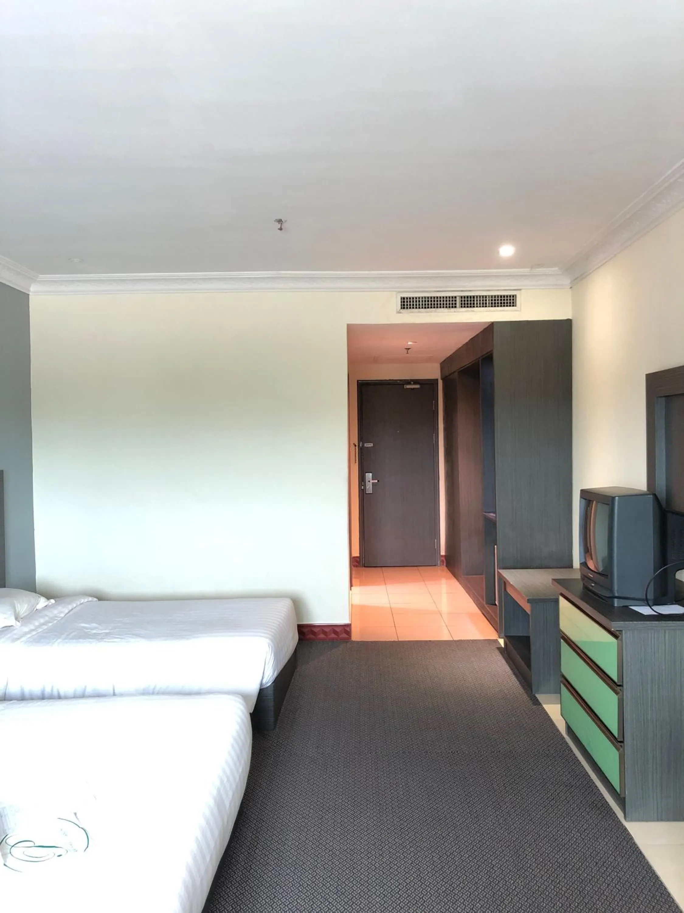 Bed in Purnama Hotel