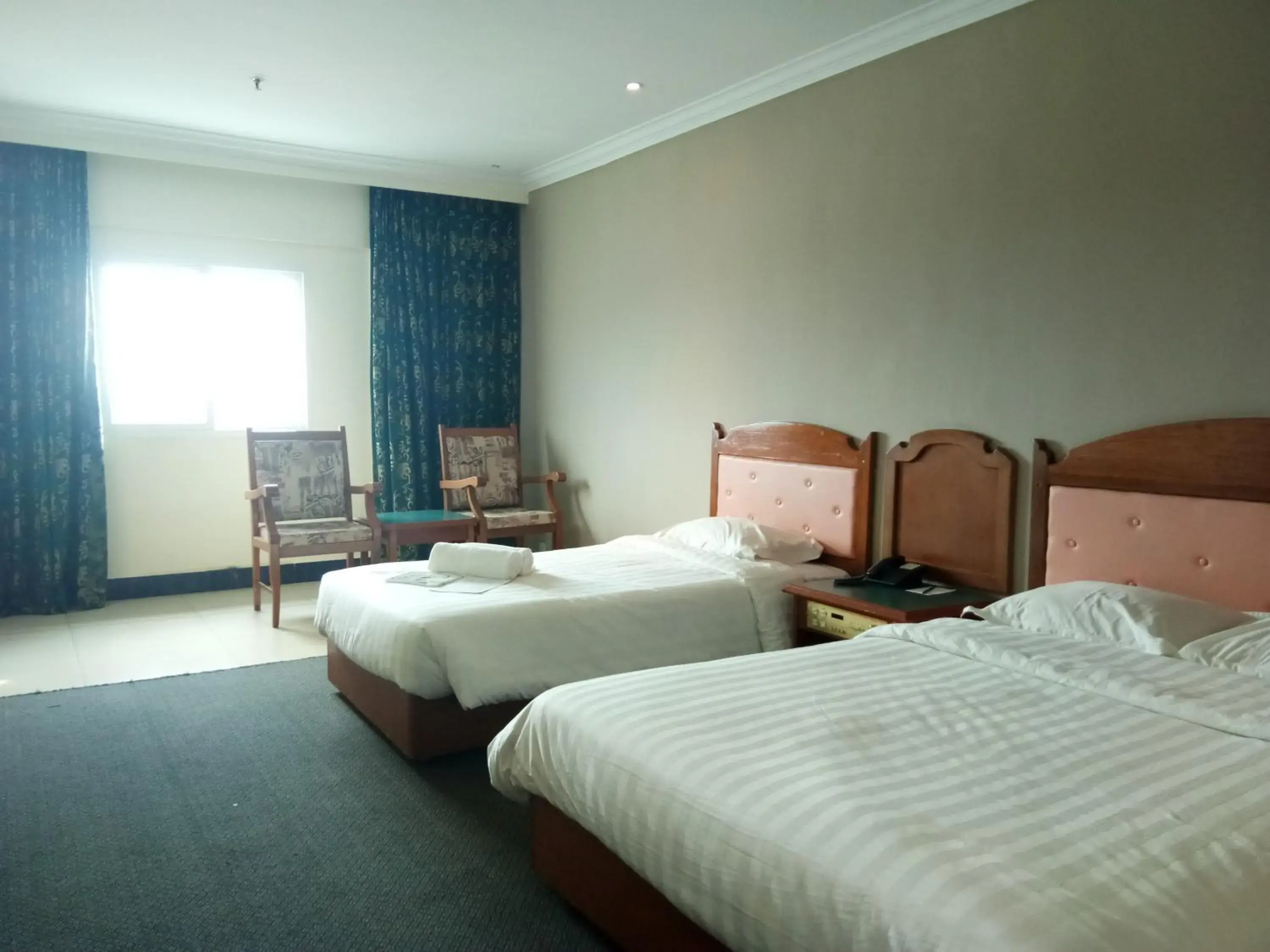 Bed in Purnama Hotel Bed in Purnama Hotel