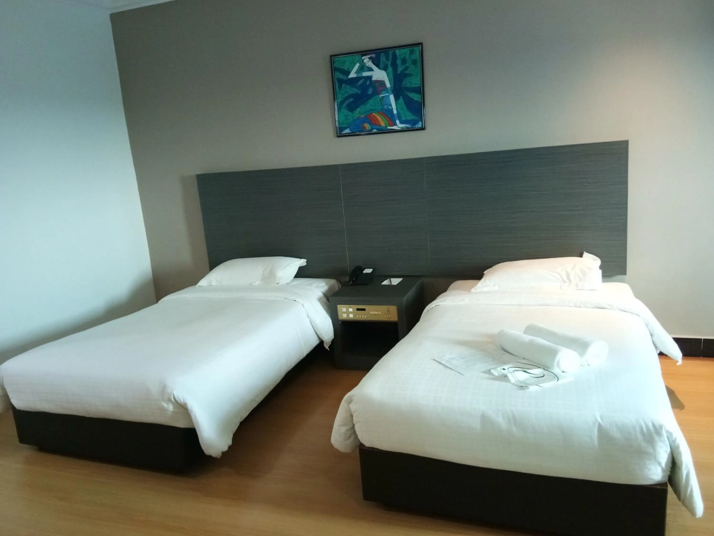 Bed in Purnama Hotel
