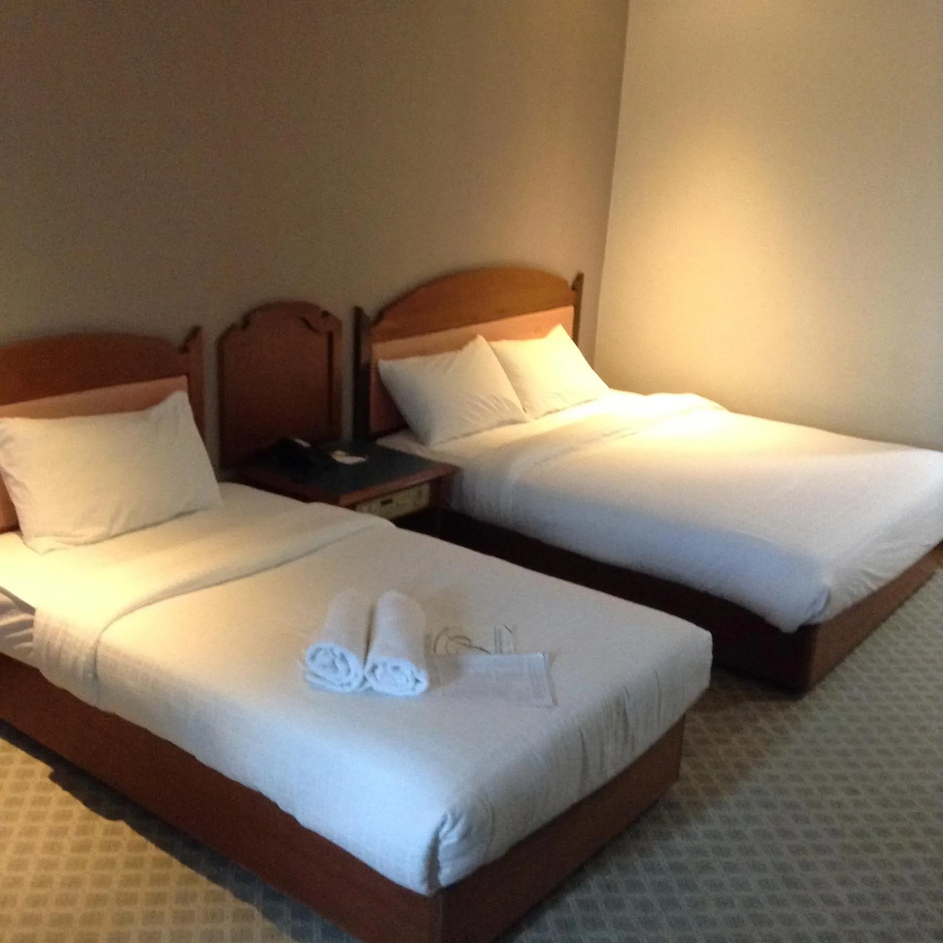 Bed in Purnama Hotel