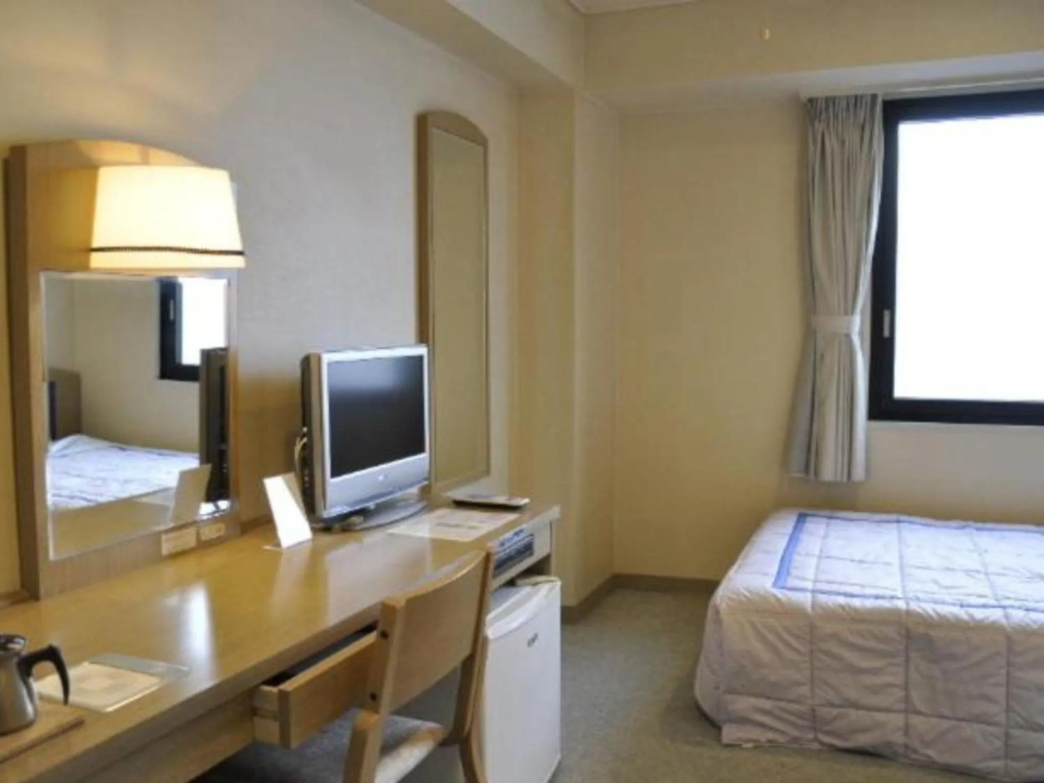 Seating area, Bed in Silk Hotel