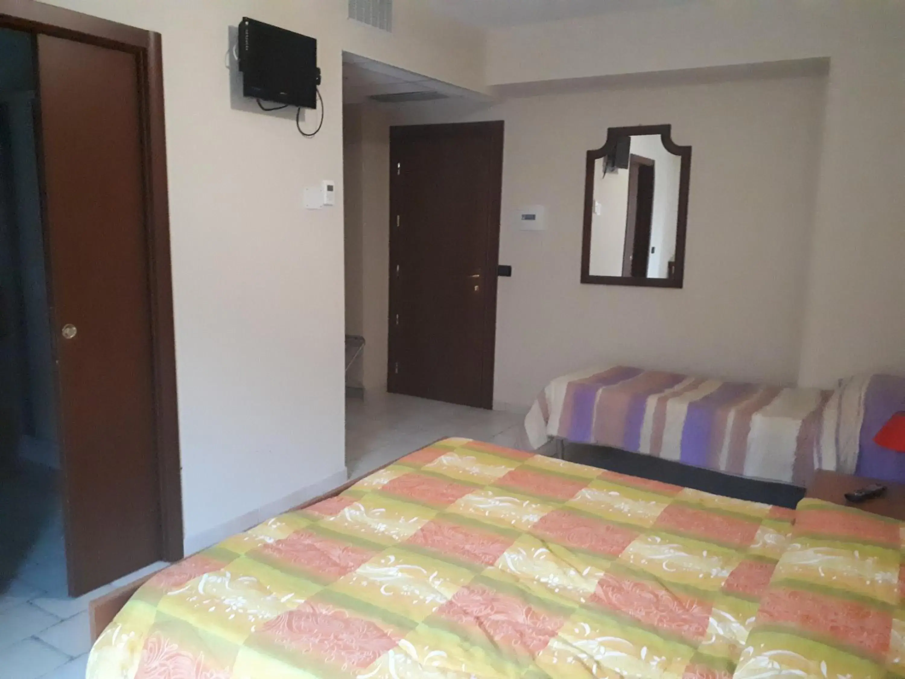 Triple Room in Lo Scoiattolo Triple Room in Lo Scoiattolo