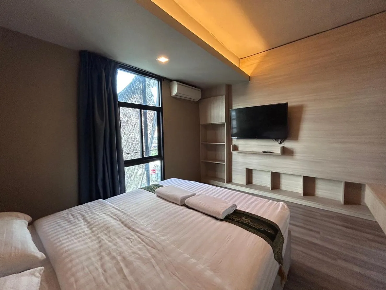 Communal lounge/ TV room, Bed in Loft2s Chiang Mai