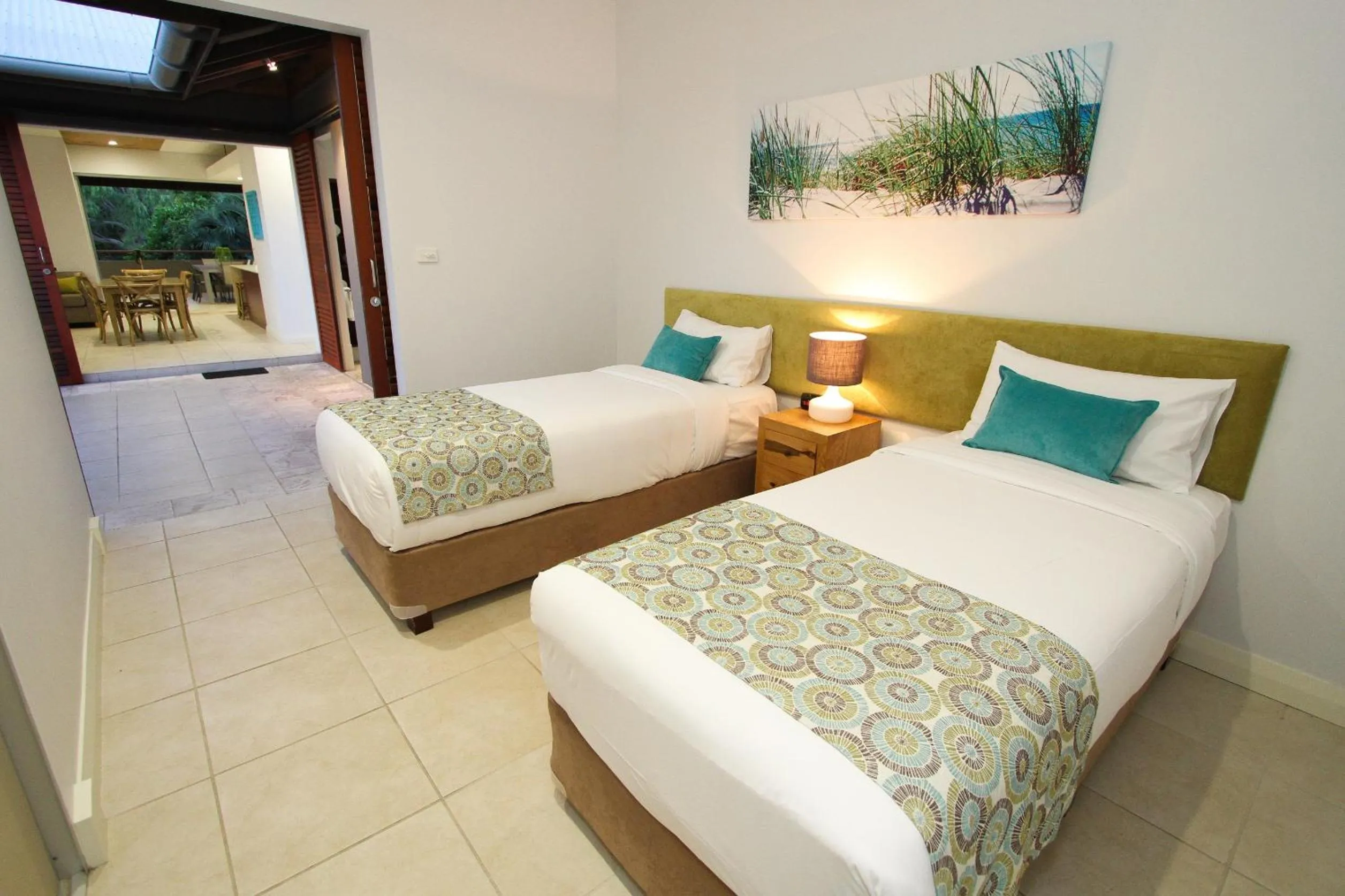 Bed in Sandcastles 1770 Motel & Resort