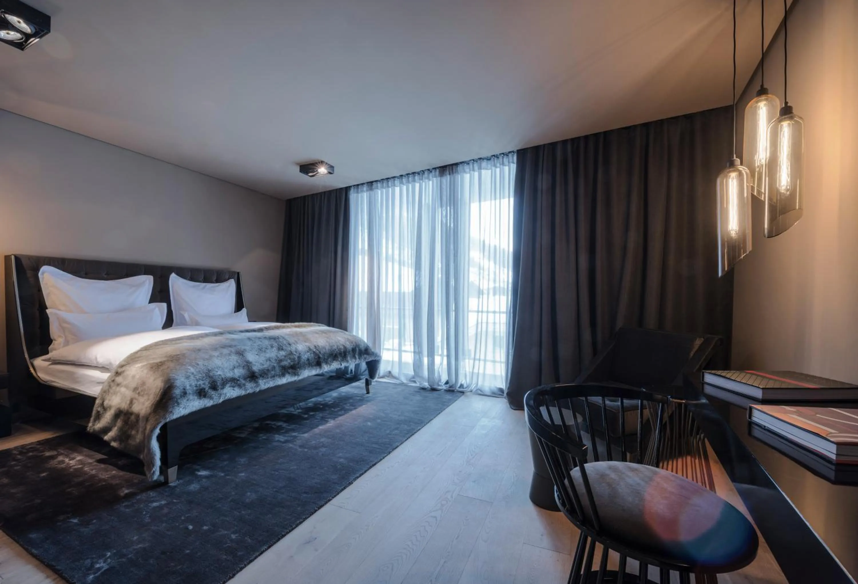 Seating area, Bed in Hotel Zhero – Ischgl/Kappl