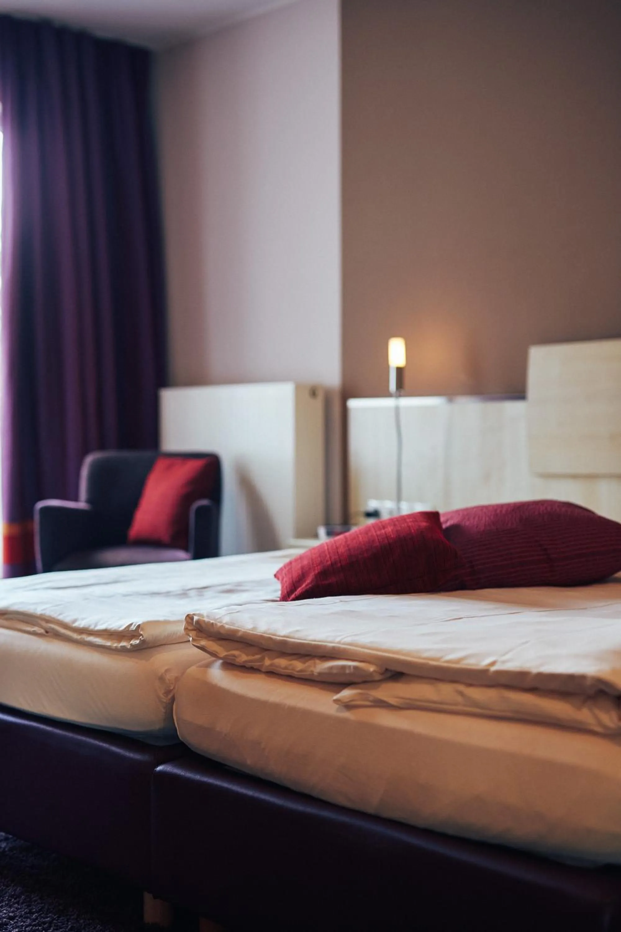 Photo of the whole room, Bed in FETZ DAS LORELEY HOTEL