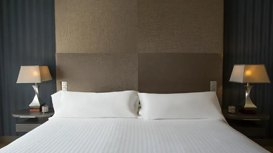 Bed in Hotel MiM Sitges & Spa