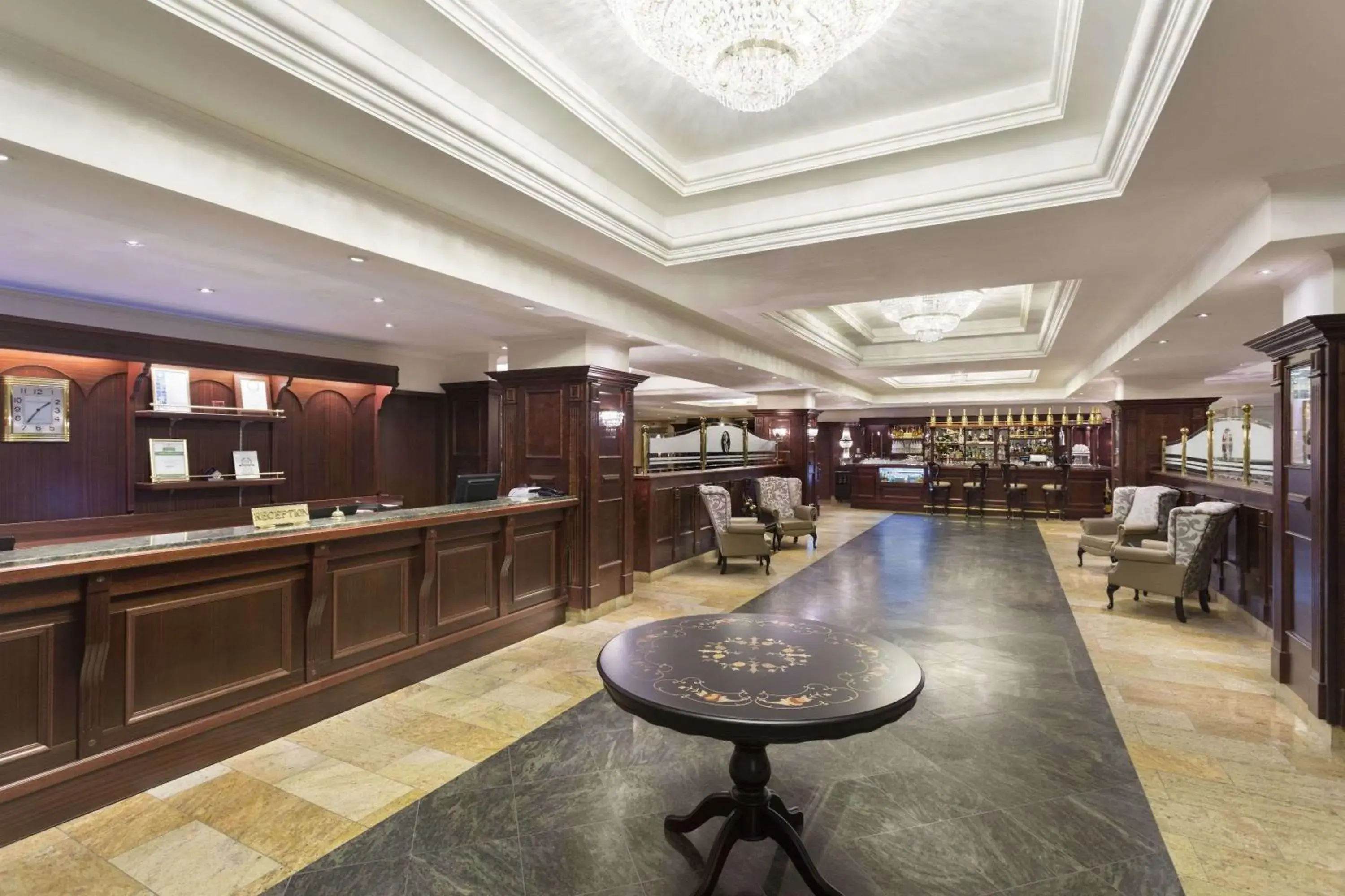 Lobby or reception in Ramada Hotel & Suites by Wyndham Bucharest North Lobby or reception in Ramada Hotel & Suites by Wyndham Bucharest North