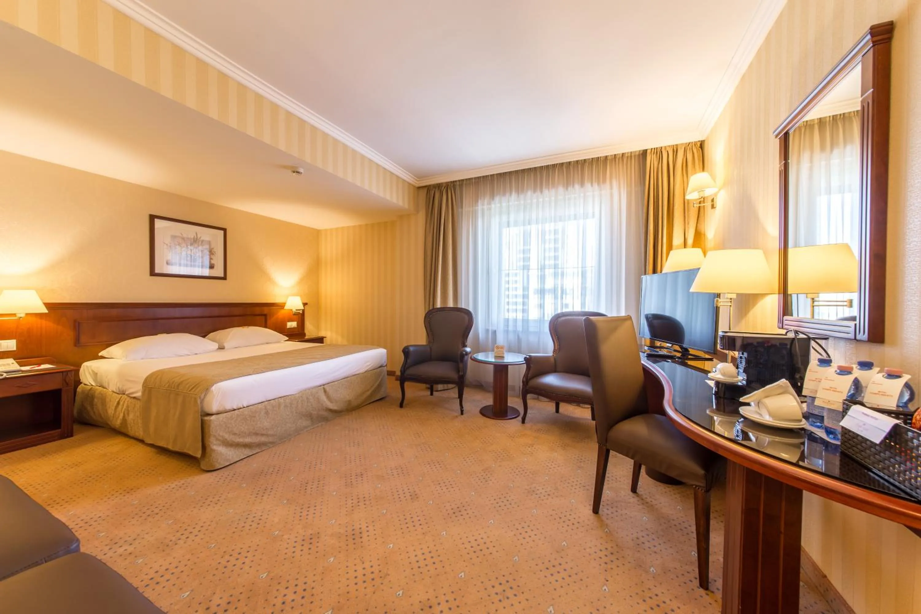 Bed in Ramada Hotel & Suites by Wyndham Bucharest North