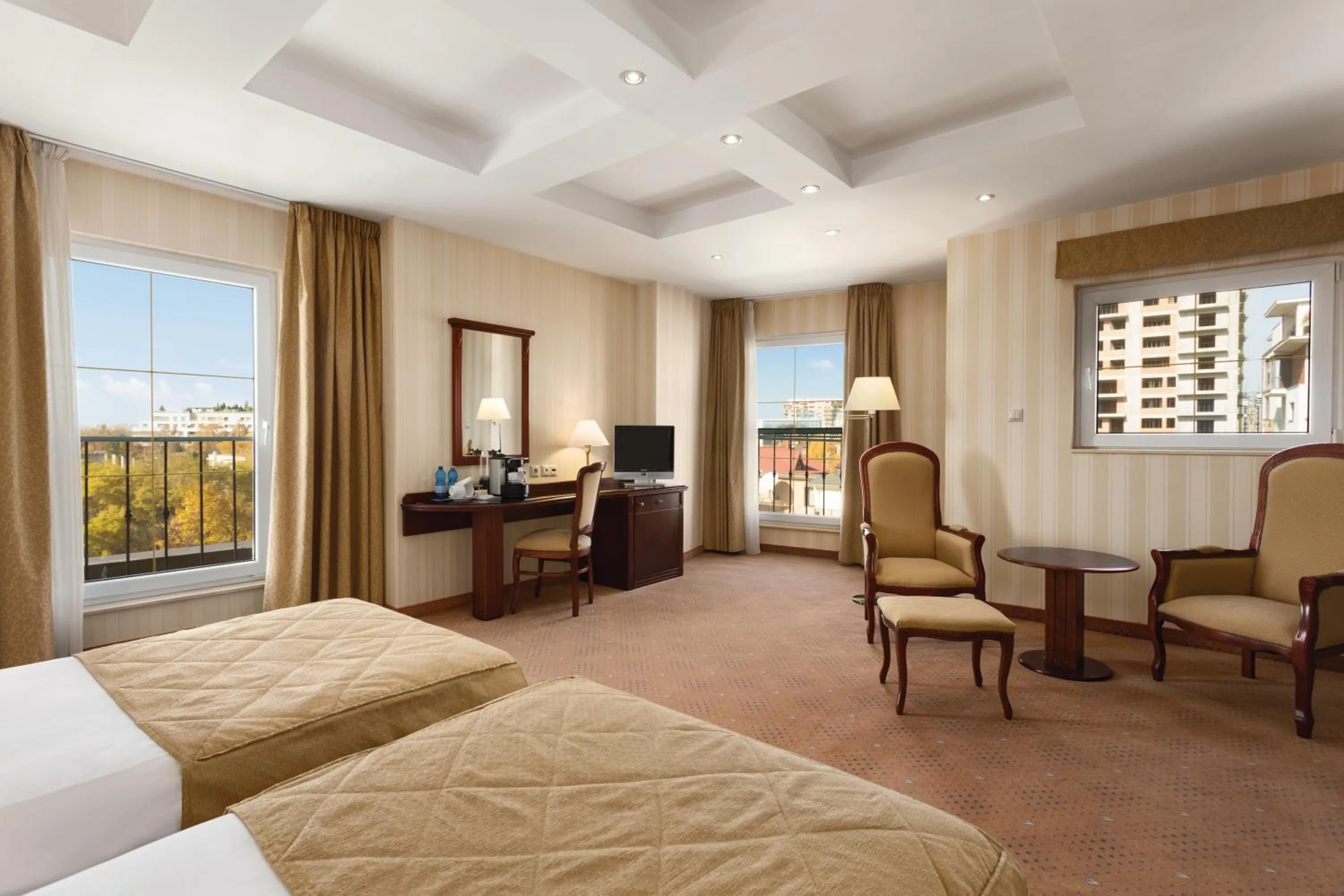 Photo of the whole room, Bed in Ramada Hotel & Suites by Wyndham Bucharest North