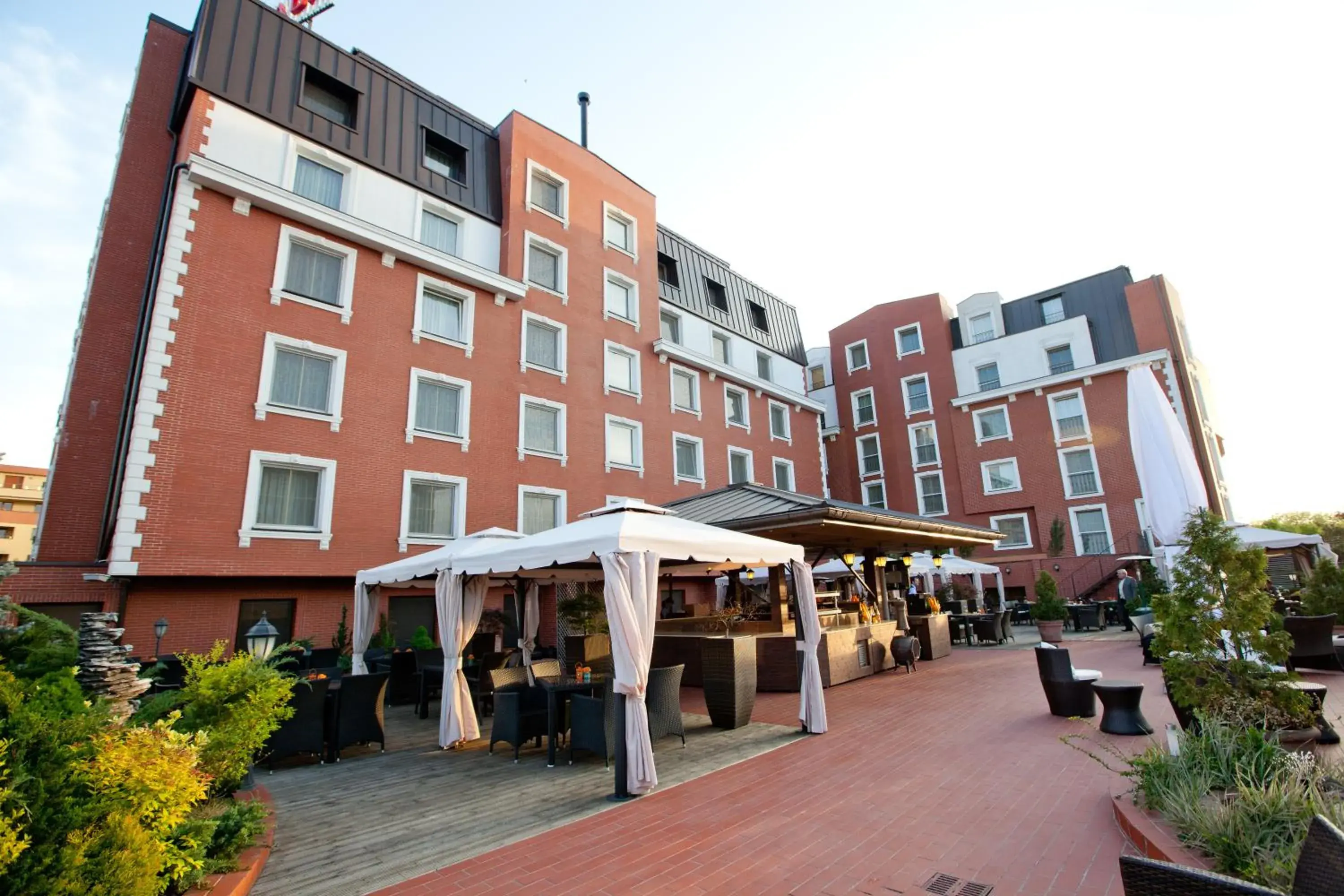 Facade/entrance in Ramada Hotel & Suites by Wyndham Bucharest North Facade/entrance in Ramada Hotel & Suites by Wyndham Bucharest North