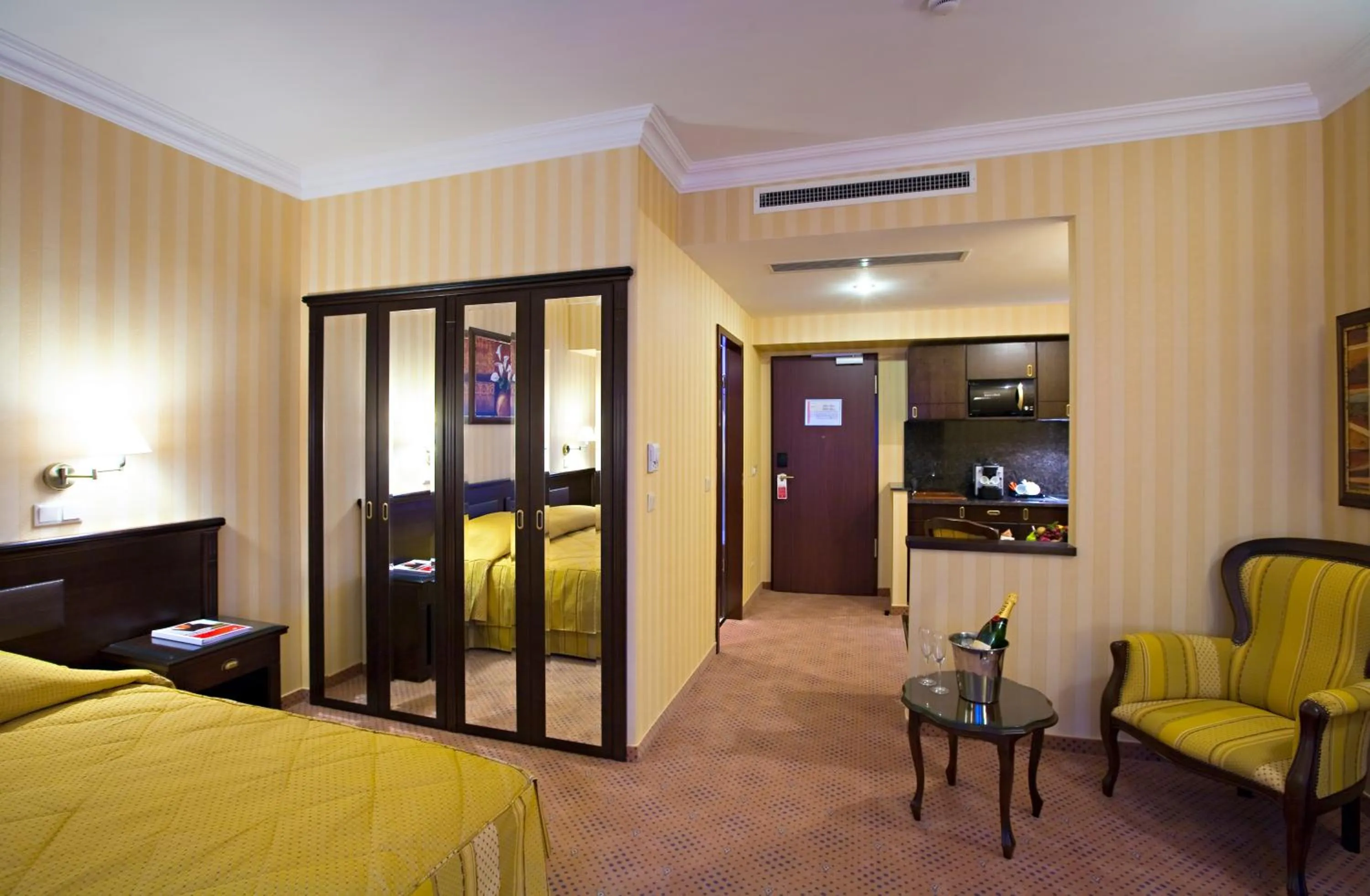 Photo of the whole room, Bed in Ramada Hotel & Suites by Wyndham Bucharest North