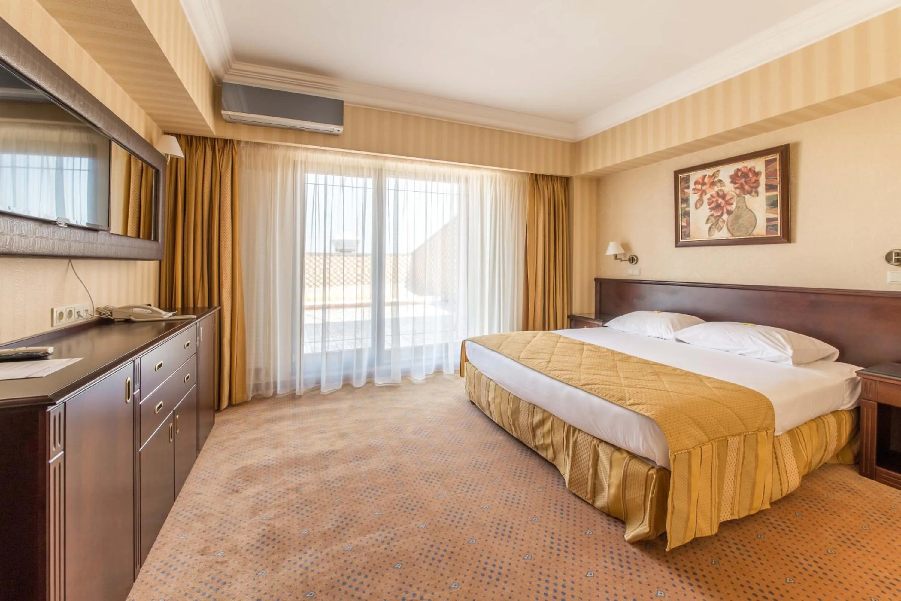 Bed in Ramada Hotel & Suites by Wyndham Bucharest North