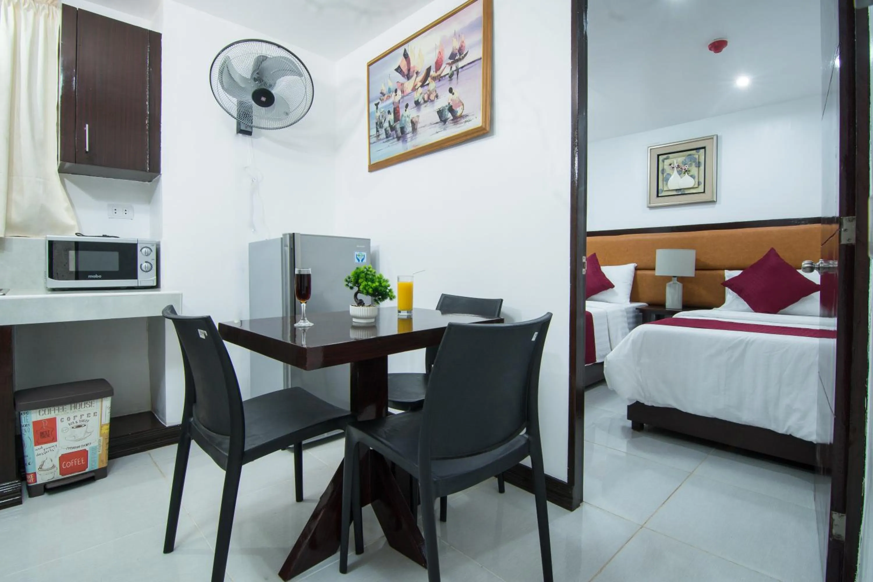 Dining area, Bed in Diamond Hotel And Resto