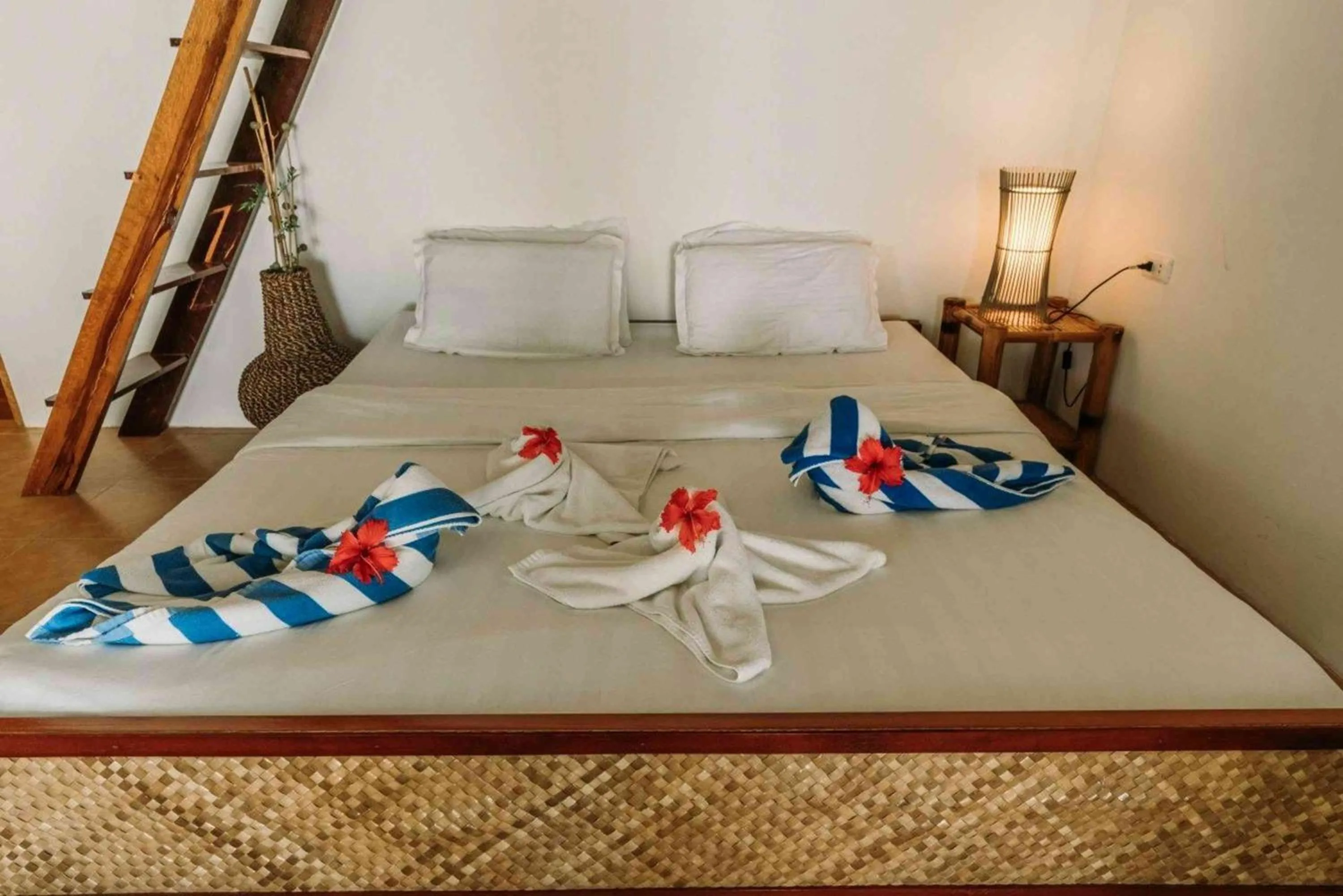 Bed in Romantic Beach Villas