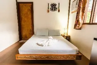 Bed in Romantic Beach Villas