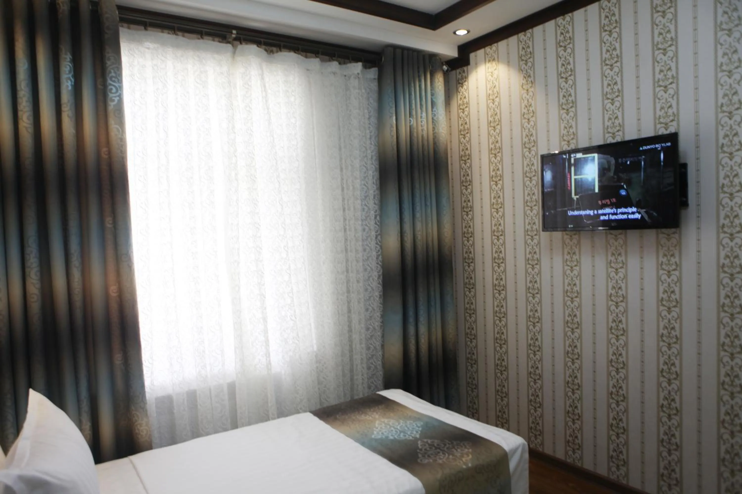 Bed in Hotel Naxshab