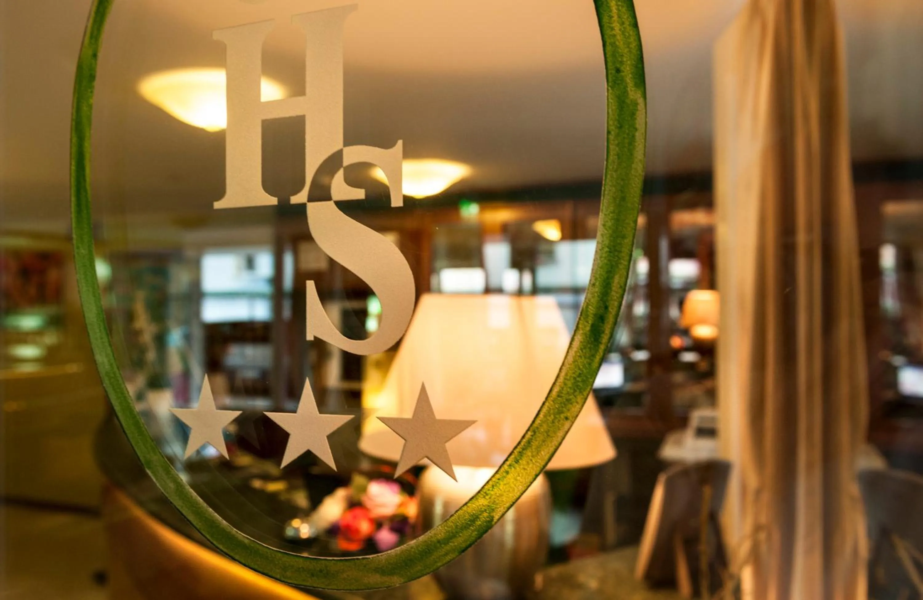 Property logo or sign in Hotel Sandra