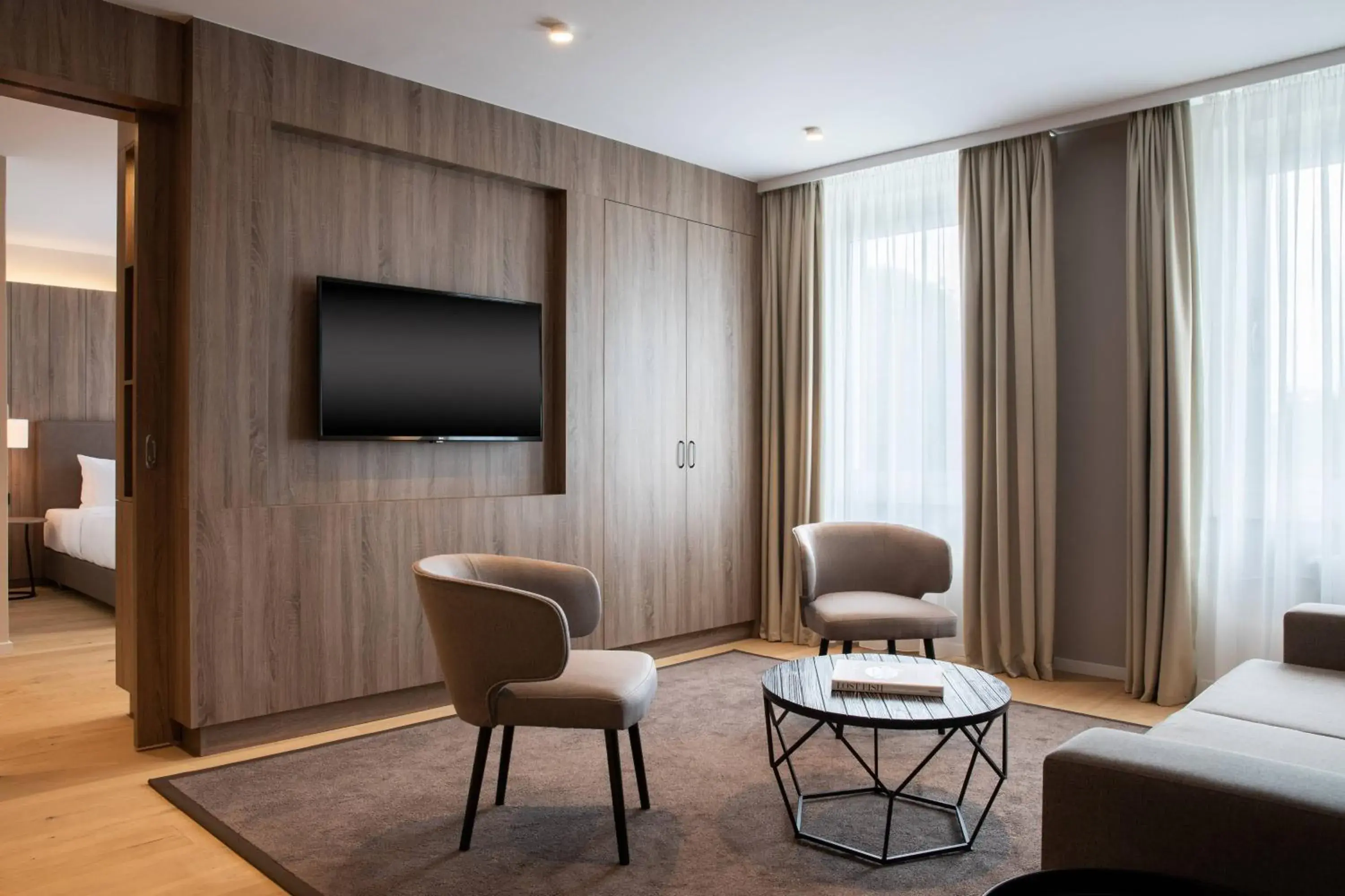 Living room, Bed in AC Hotel by Marriott Berlin Humboldthain Park Living room, Bed in AC Hotel by Marriott Berlin Humboldthain Park