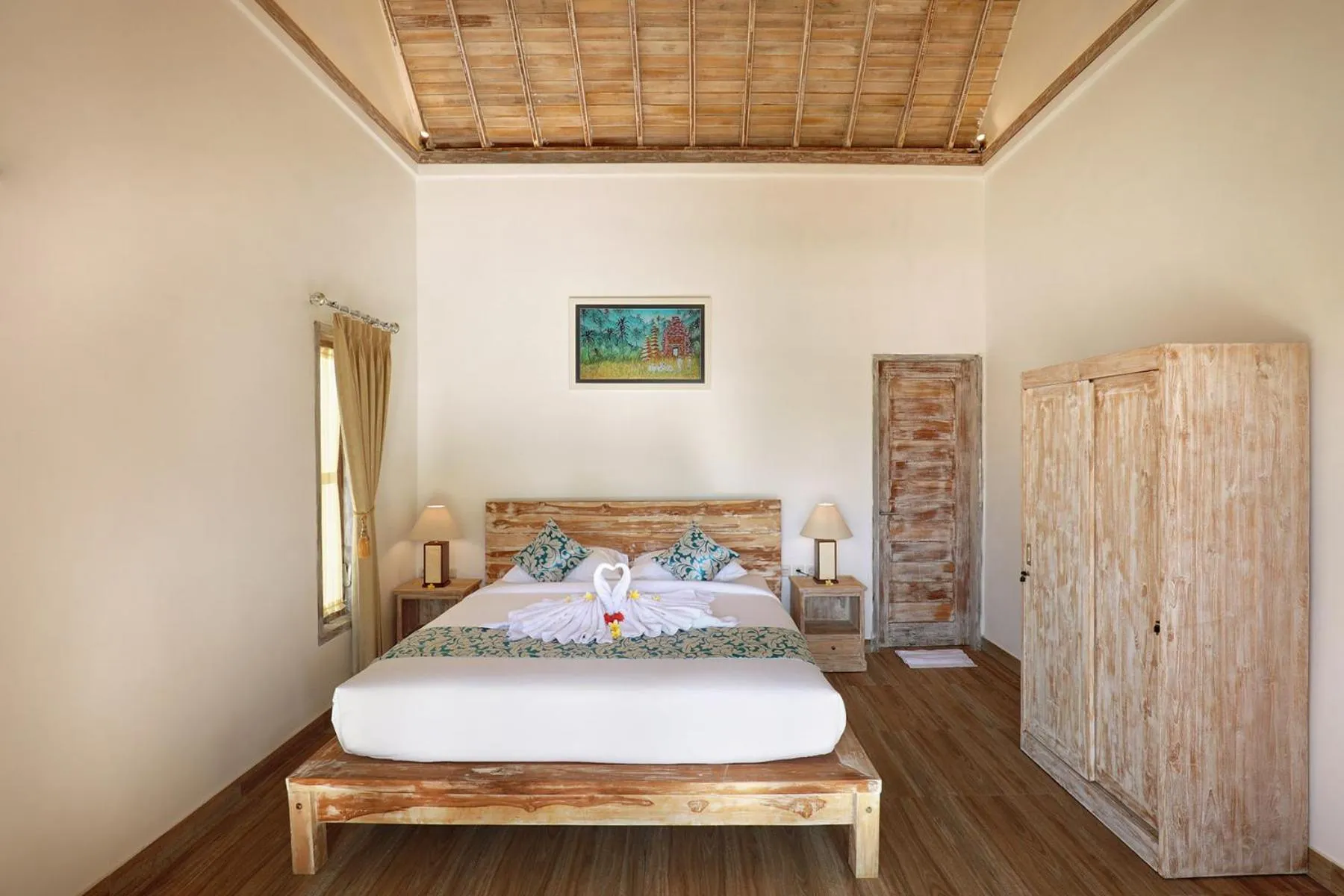 Bed in Bukal Sari Villas Uluwatu